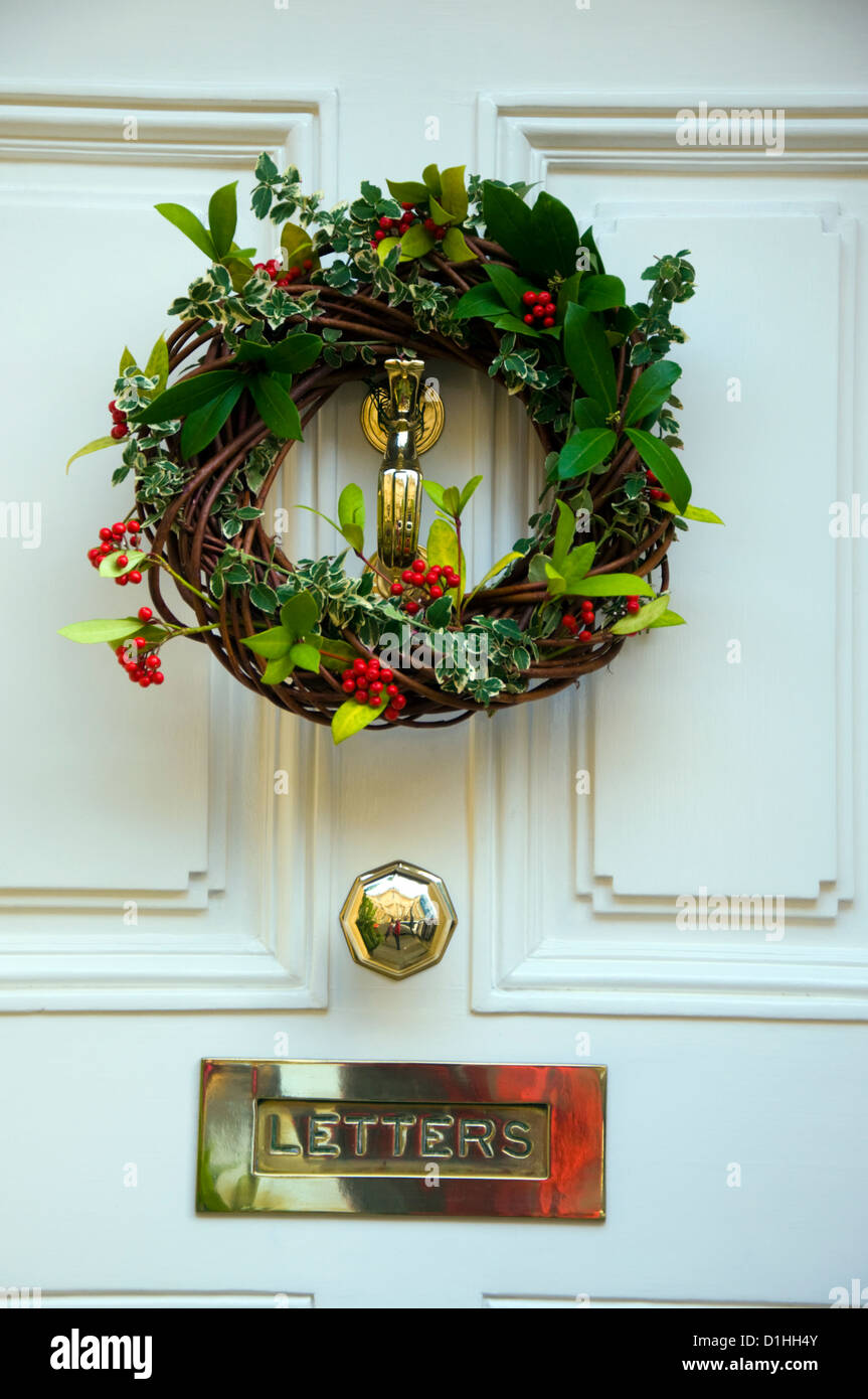 Christmas wreath on front door Stock Photo Alamy