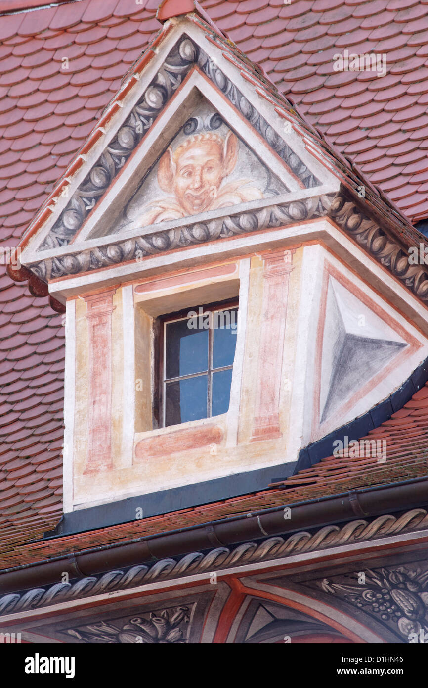 Decorated dormer window of Krumlov Castle, Cesky Krumlov, South Bohemia, Czech Republic. Stock Photo
