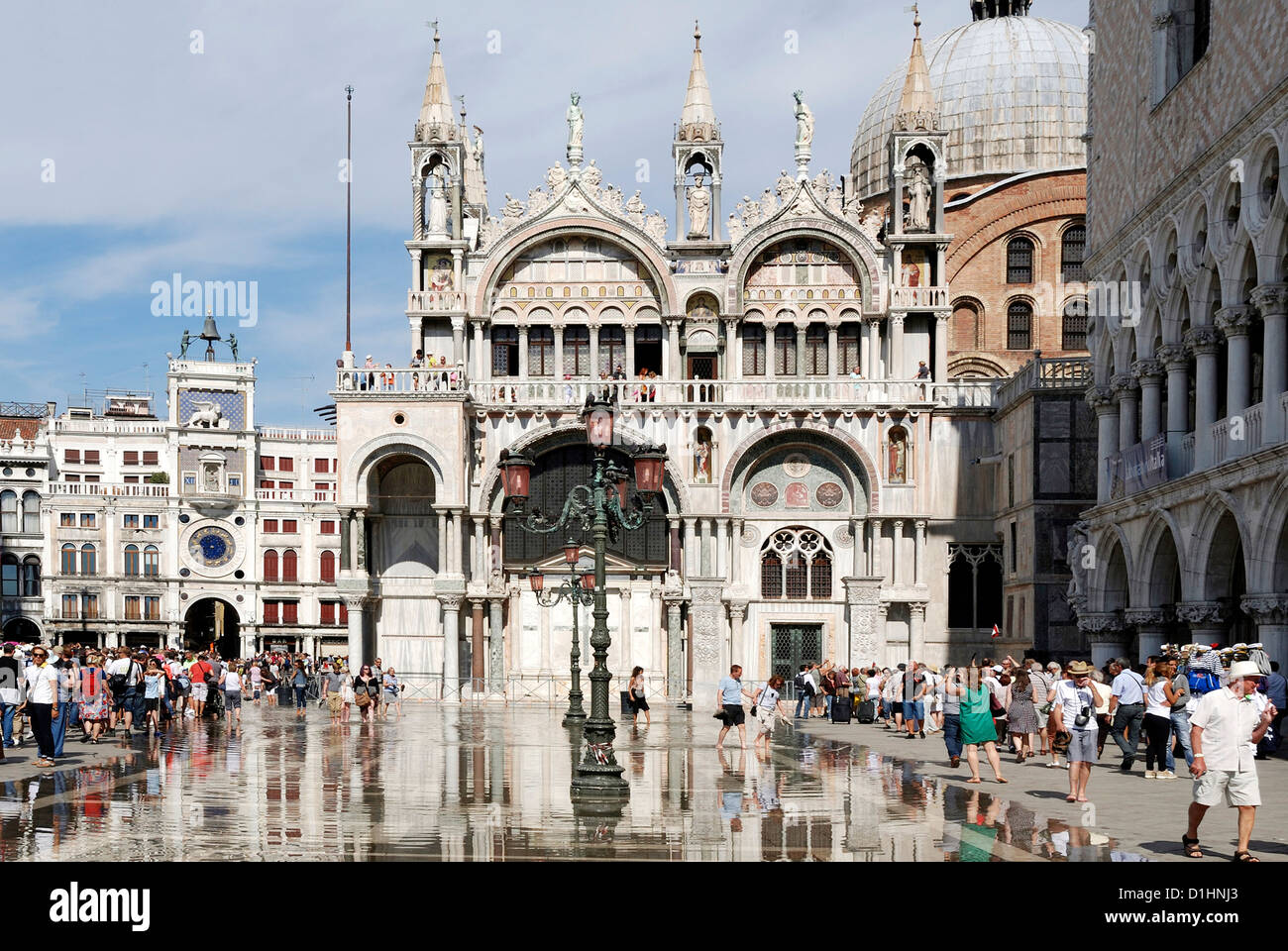 St Mark's Square in Venice at the St Mark's Basilica at high water - Acqua alta. Stock Photo