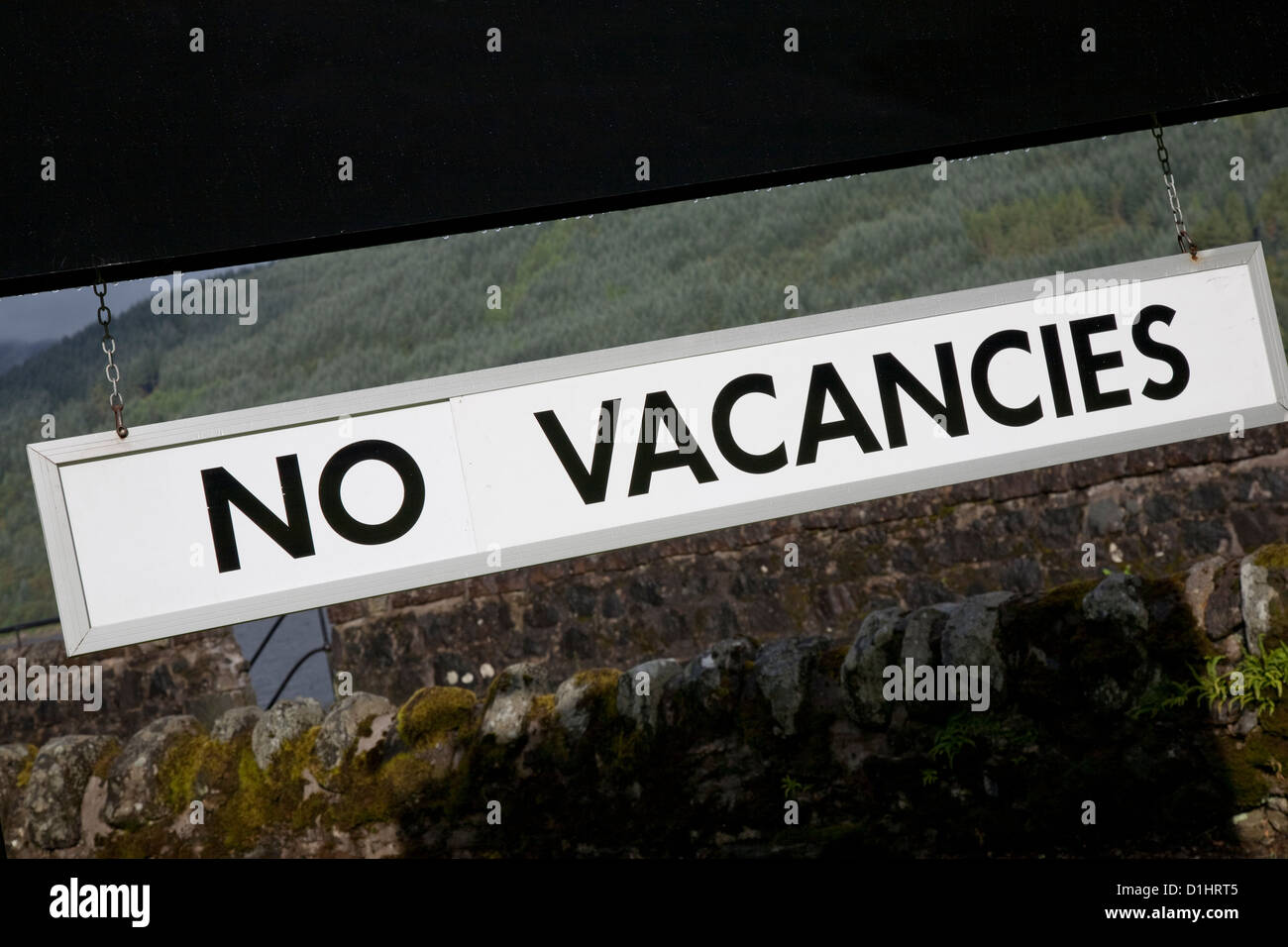 No Vacancies Sign outside Hotel in Rural Setting Stock Photo