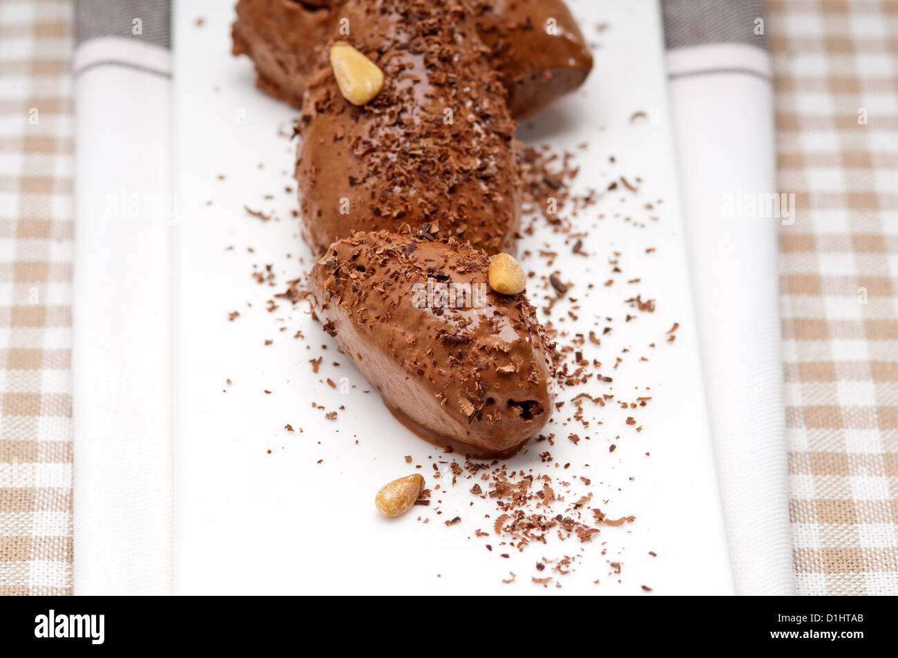 fresh home made chocolate mousse quenelle dessert Stock Photo Alamy