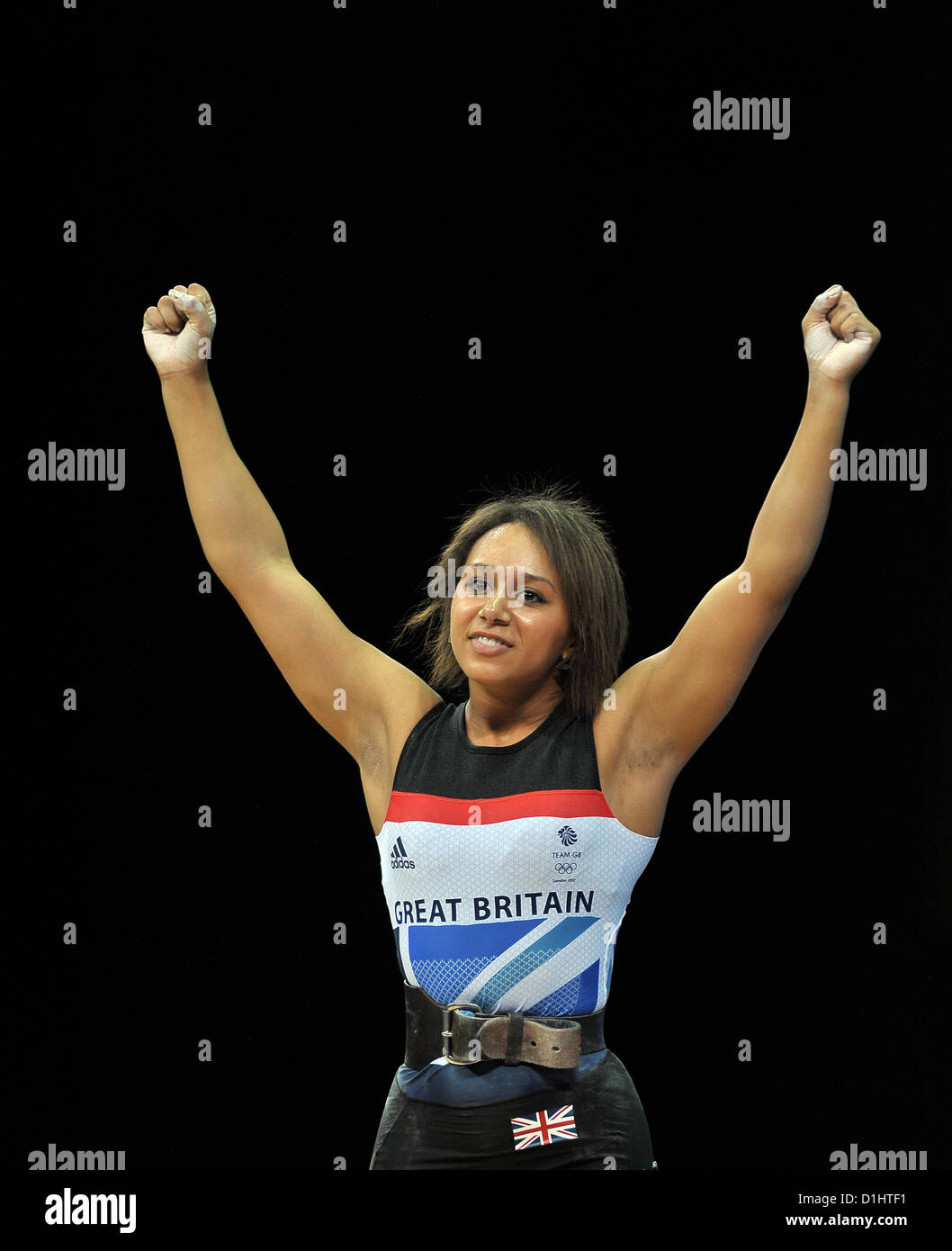 Zoe Smith (Great Britain) raises her arms to celebrate after setting a