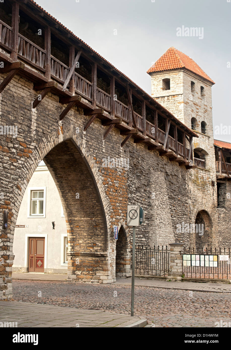 Old town gate and city walls on Suur Kloostri street in Tallinn, the capital of Estonia. Stock Photo