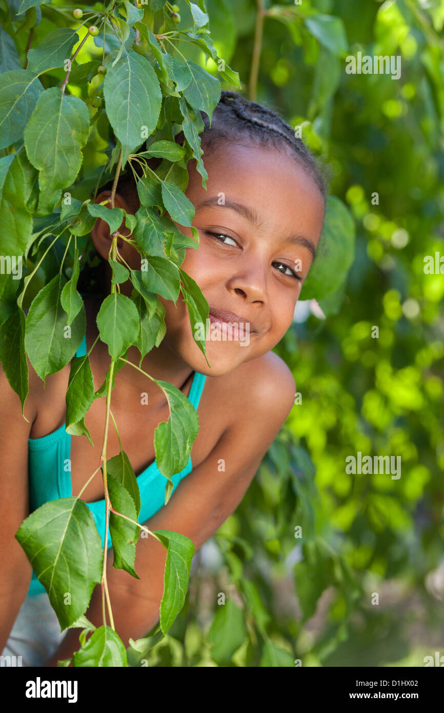Outdoor portrait of a cute little African American girl Stock Photo - Alamy