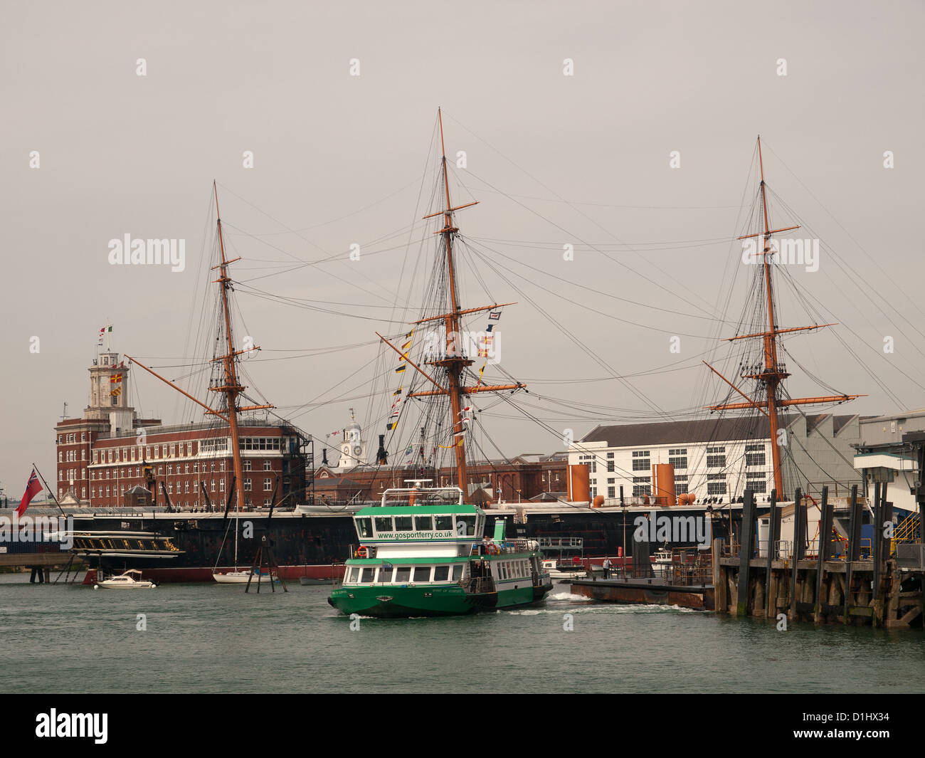 HMS Warrior and Gosport ferry Portsmouth Harbour Hampshire England UK Stock Photo
