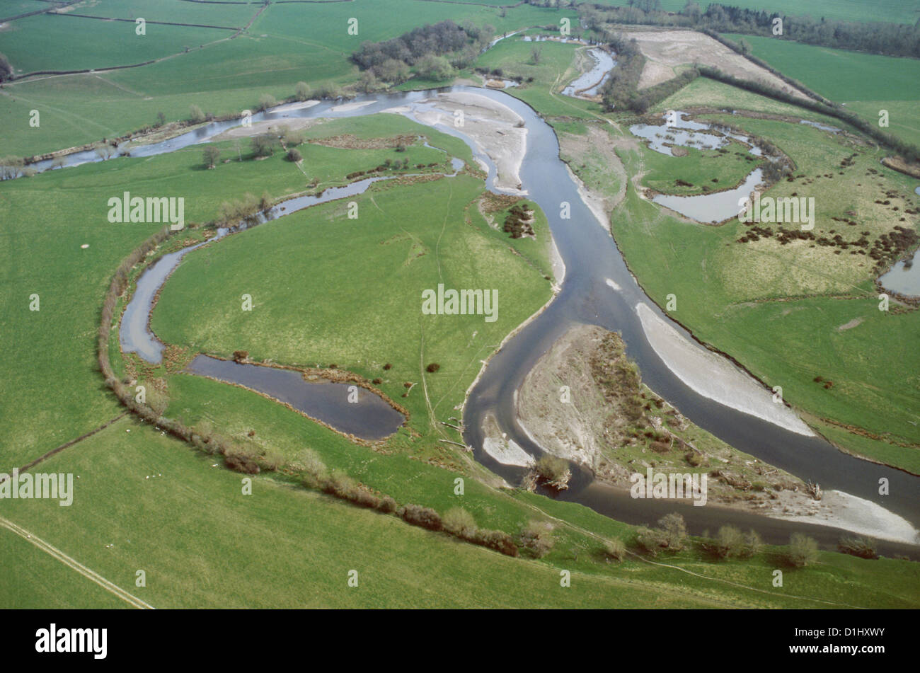 Aerial view of oxbow lake formed when river shortens course, bypassing meander Wales UK Stock Photo