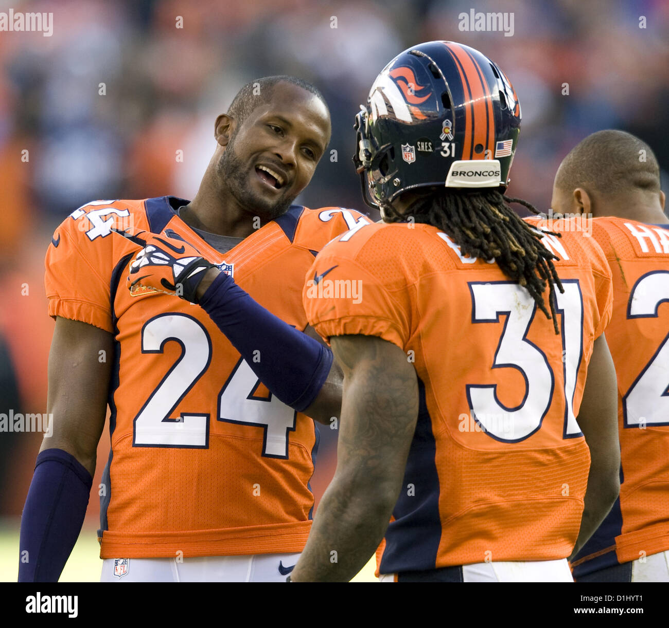 Dec. 23, 2012 - Denver, CO, USA - Broncos CB CHAMP BAILEY, left, talks to team mate OMAR BOLDEN, right, about a blown coverage during the 2nd. half at the Sports Authority Field at Mile High Sunday afternoon. The Broncos beat the Browns 34-12. (Credit Image: © Hector Acevedo/ZUMAPRESS.com) Stock Photo