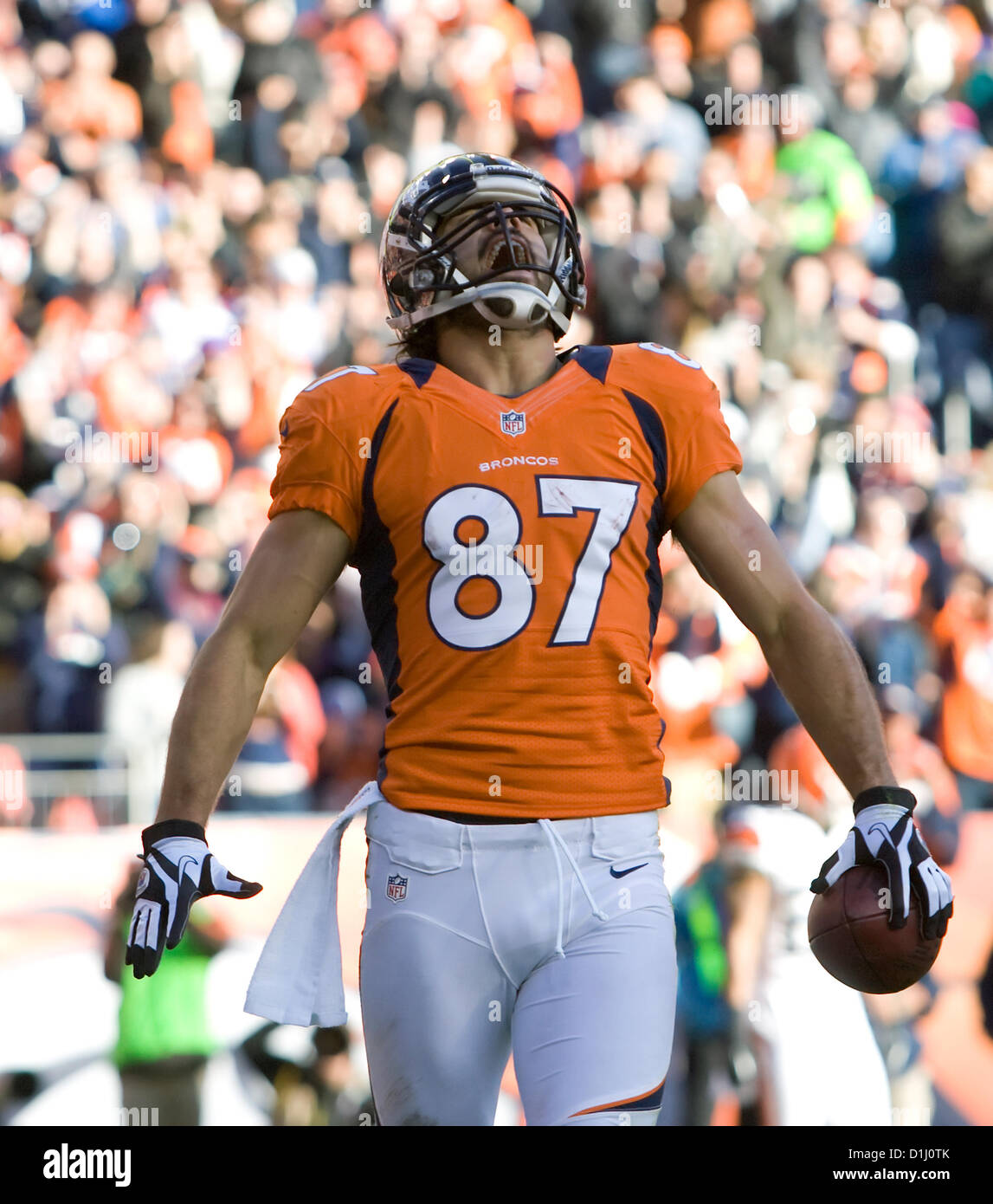 Dec. 23, 2012 - Denver, Colorado, U.S. - Broncos WR ERIC DECKER reacts to  receiving a touchdown pass in the first half at Sports Authority Field at  Mile High Sunday afternoon. The, image size:1147x1390