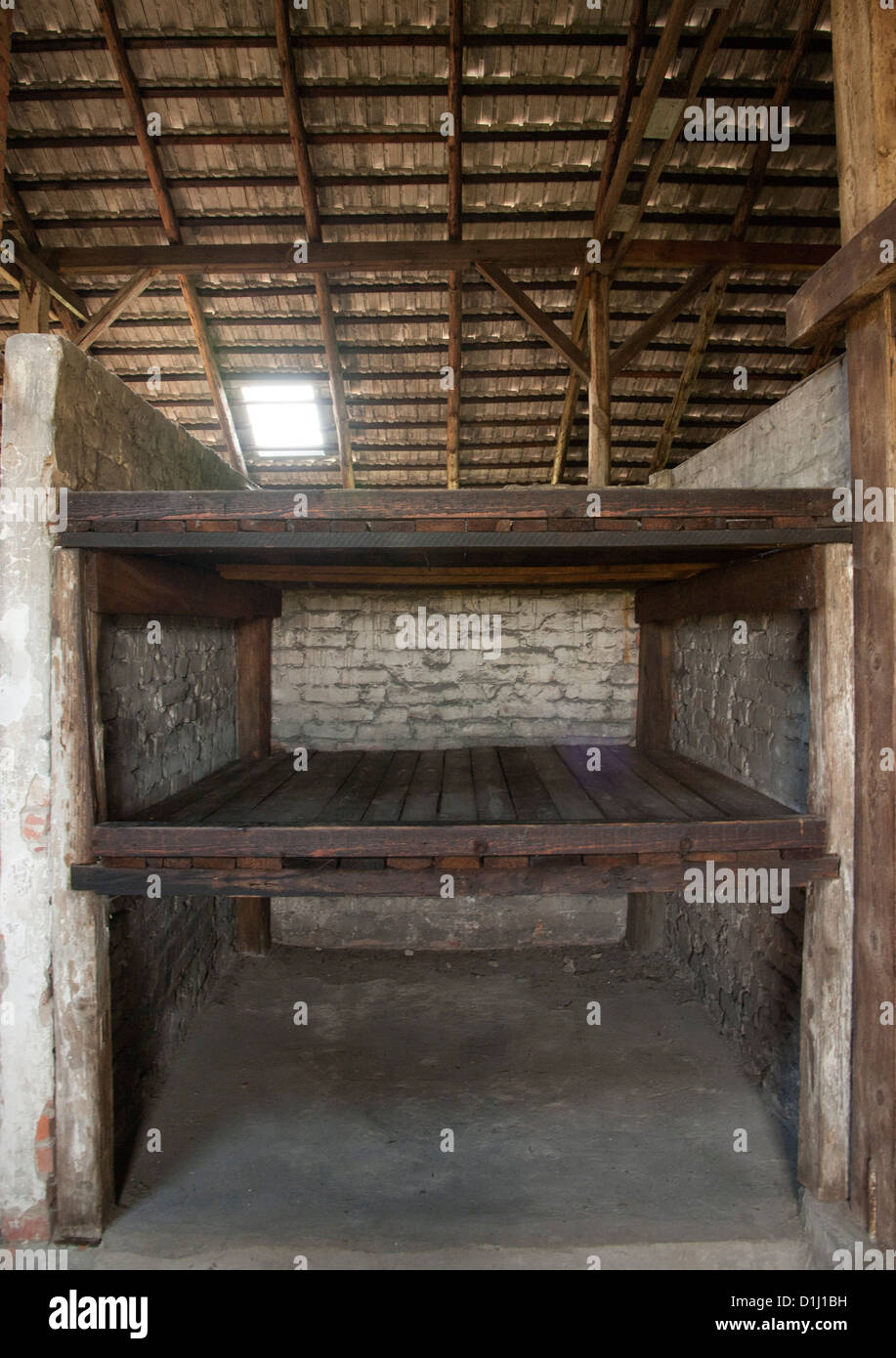 Interior of one of the barracks in the former Auschwitz II–Birkenau concentration camp in southern Poland. Stock Photo