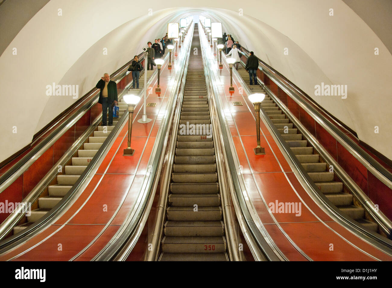 Escalators of the St Petersburg metro system in Saint Petersburg, Russia. It is one of the deepest metro systems in the world. Stock Photo