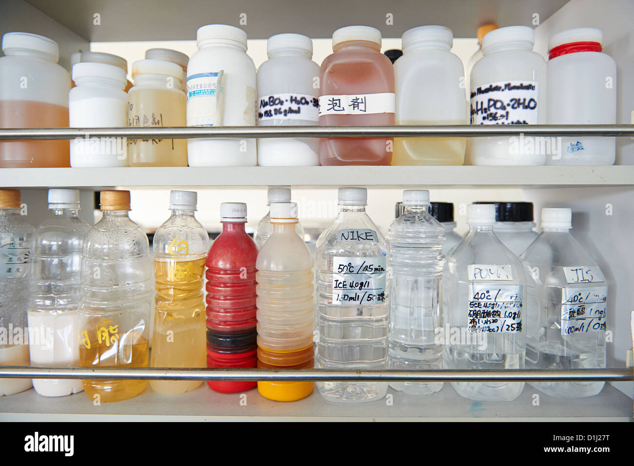 Chemical samples and mixtures at a fabric factory Stock Photo Alamy