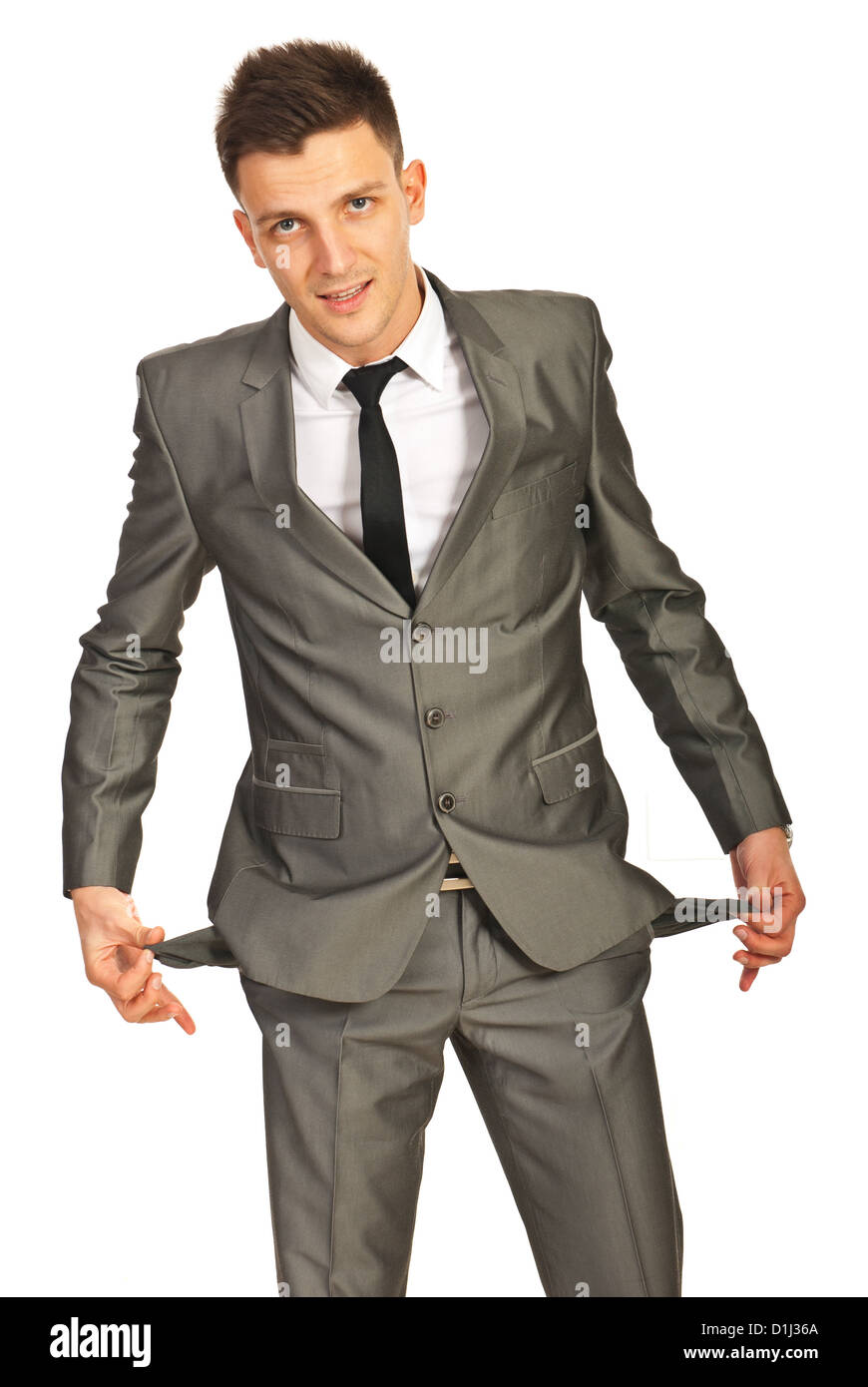 Business man showing empty pant pockets isolated on white background