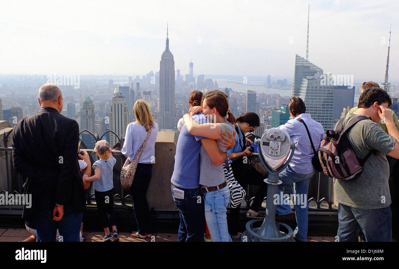 Tourist's on top of The Rock viewing the Empire State building, New York City USA. Stock Photo