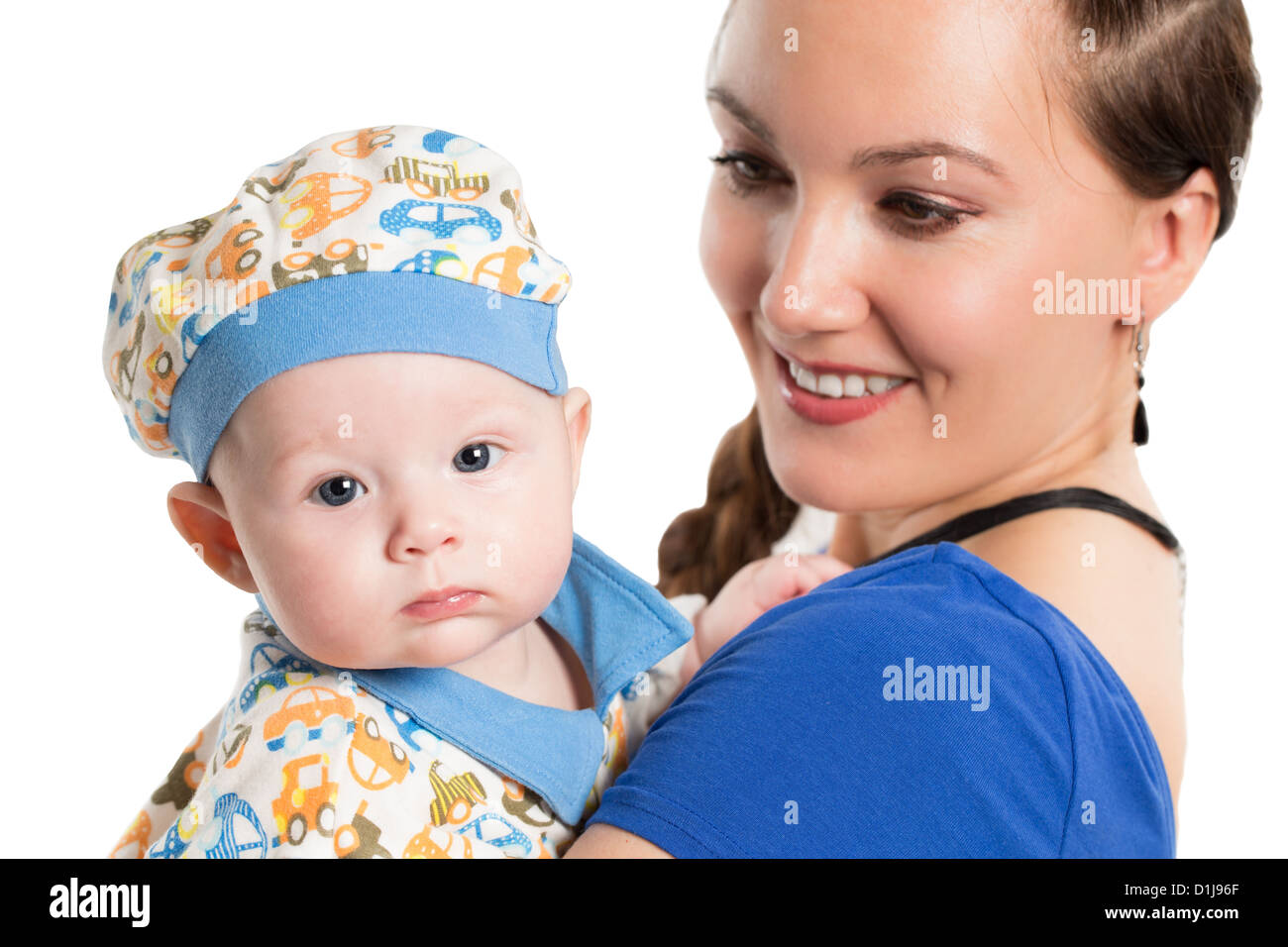 Happy mom and baby girl hugging on isolated white background. Focus on child Stock Photo