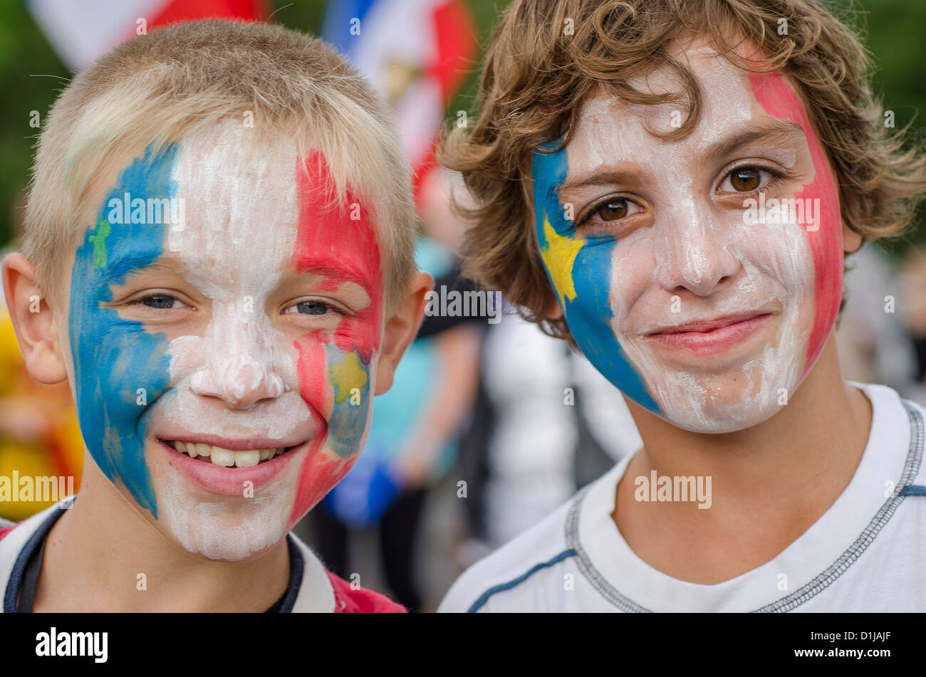 Boys with painted faces at the Acadian Day Tintamarre, Squatec, Quebec, Canada Stock Photo