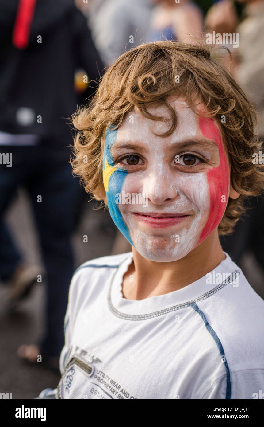 Boy with painted face at the Acadian Day Tintamarre, Squatec, Quebec, Canada Stock Photo