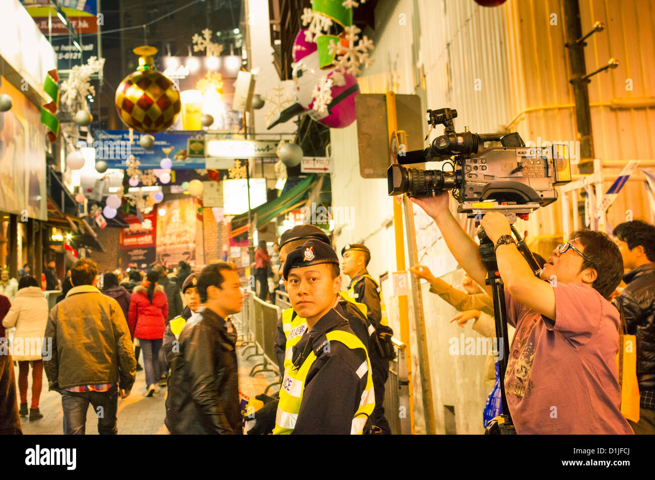 Christmas celebrations in Hong Kong, area around Lan Kwai Fong had been regulated to control the crowd. Stock Photo