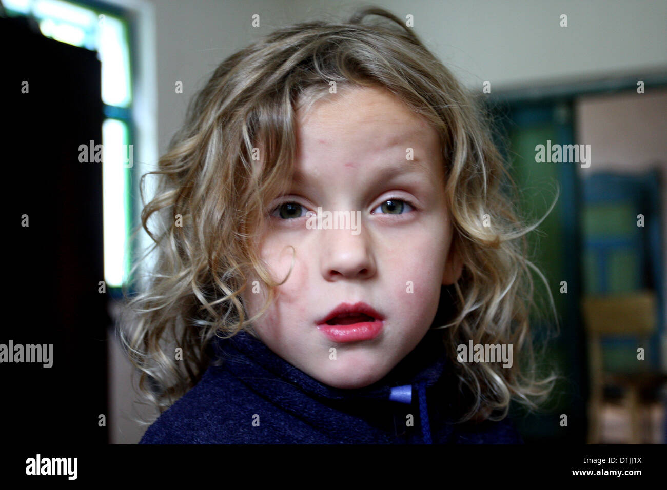 Portrait of the blond boy look like girl Stock Photo Alamy
