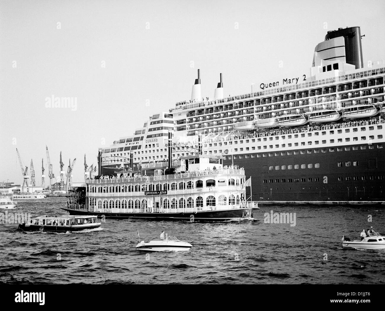 Cunard's Queen Mary 2 departing from the port of Hamburg. Stock Photo