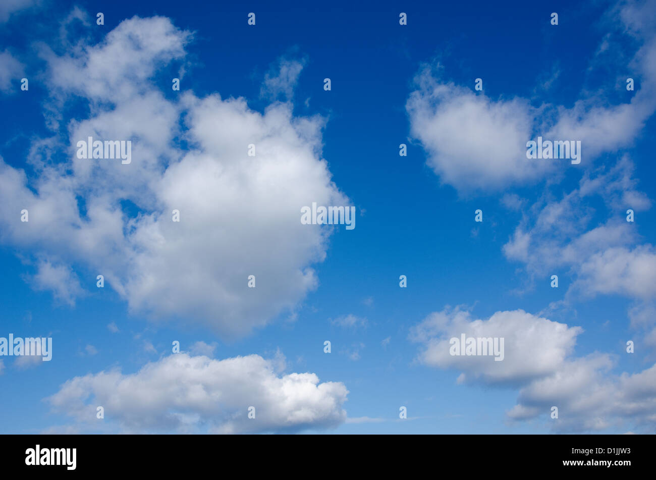 White clouds on a deep blue sky background Stock Photo - Alamy