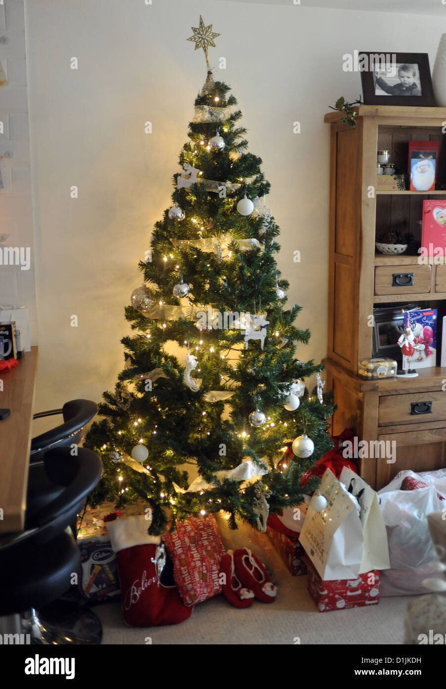 Christmas tree and presents UK Stock Photo - Alamy