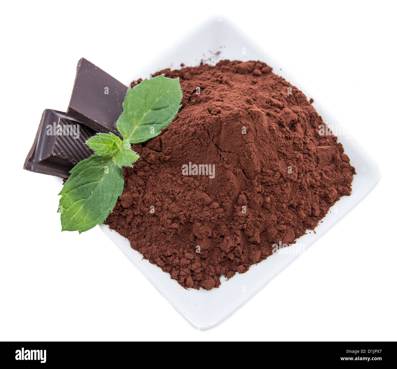 Cocoa with Chocolate pieces isolated on white background Stock Photo