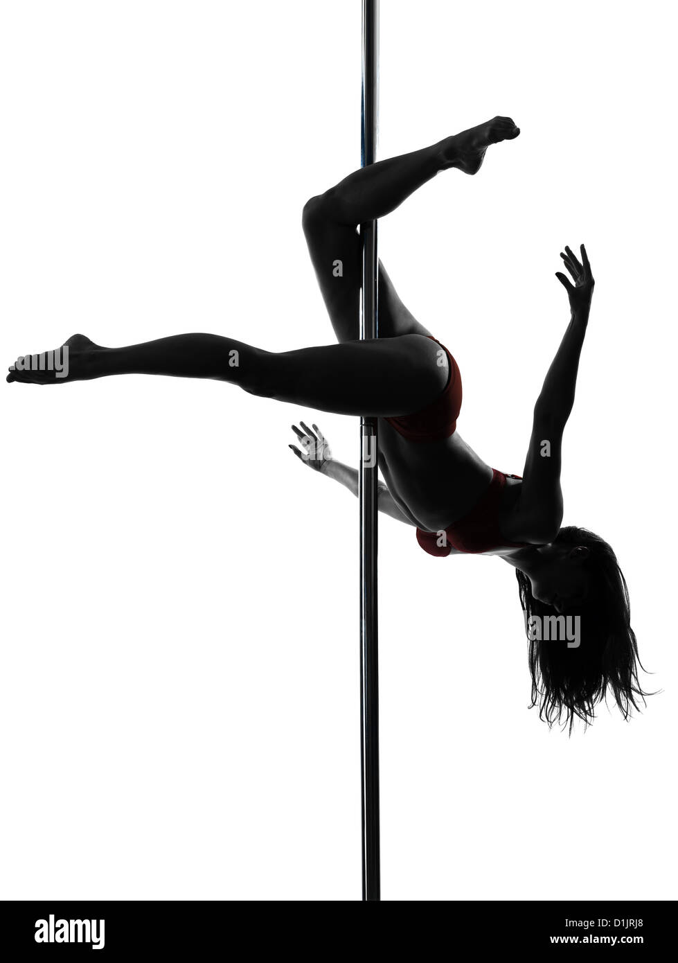 one  woman pole dancer dancing in silhouette studio isolated on white background Stock Photo
