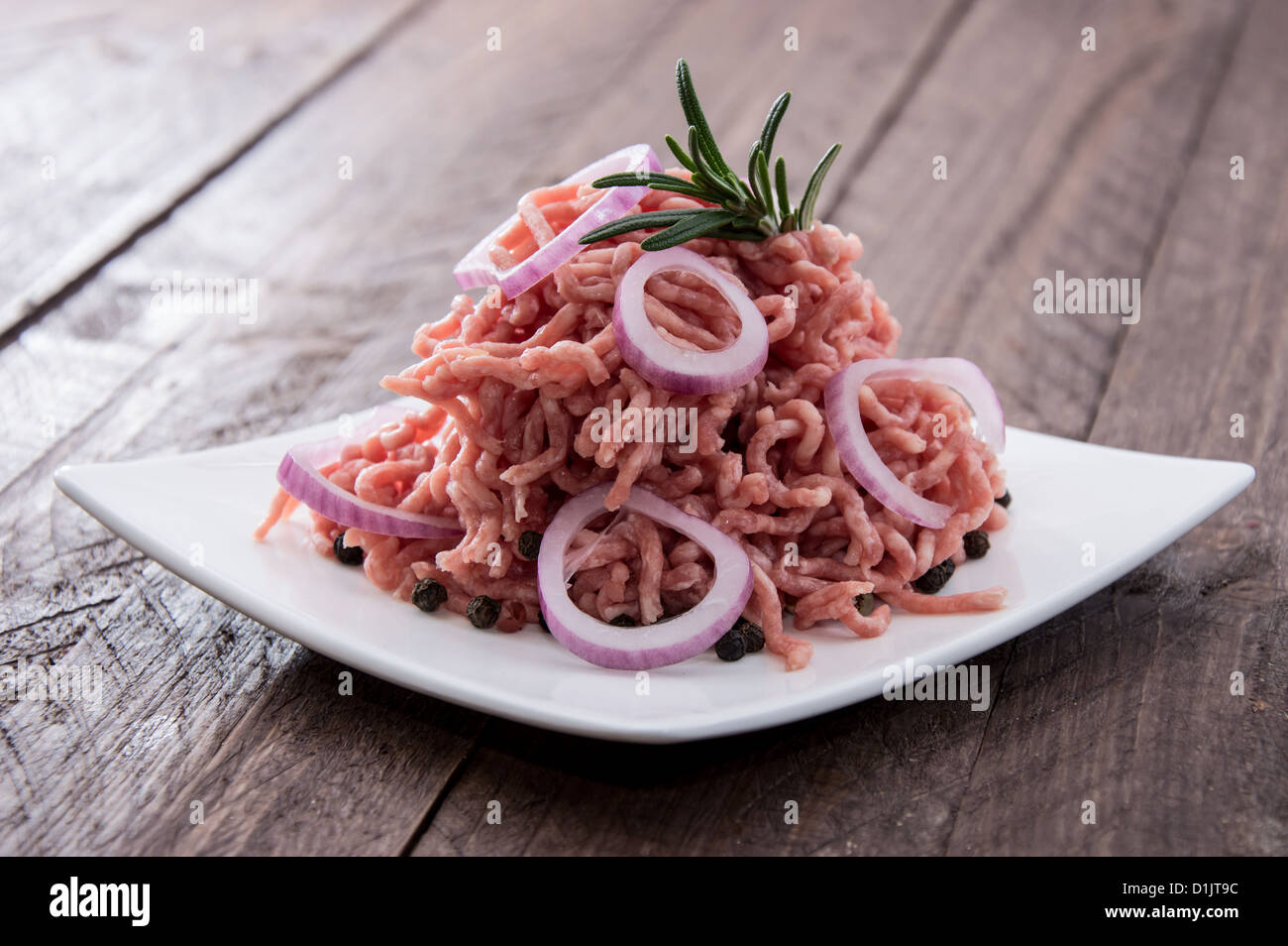 Minced Meat on wooden background Stock Photo