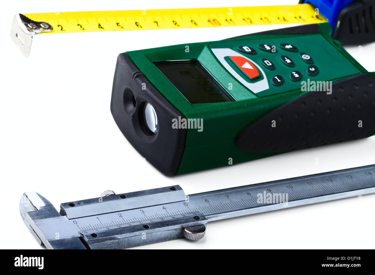 Roulette, calliper and laser range finder on a white background Stock ...