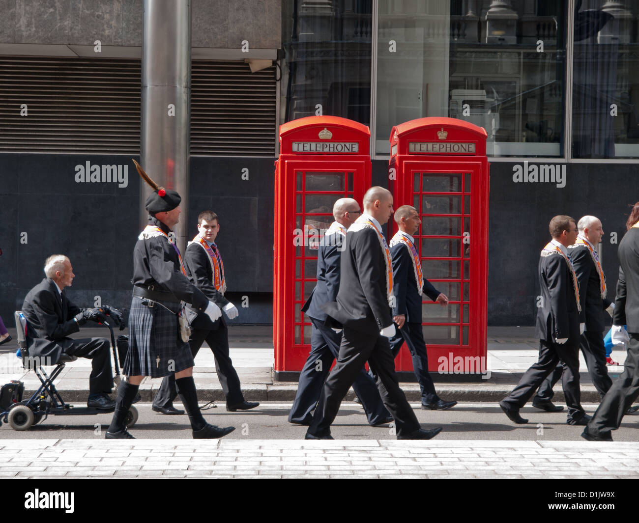 An Orange Order march through the streets of London, during the summer of 2012. Stock Photo