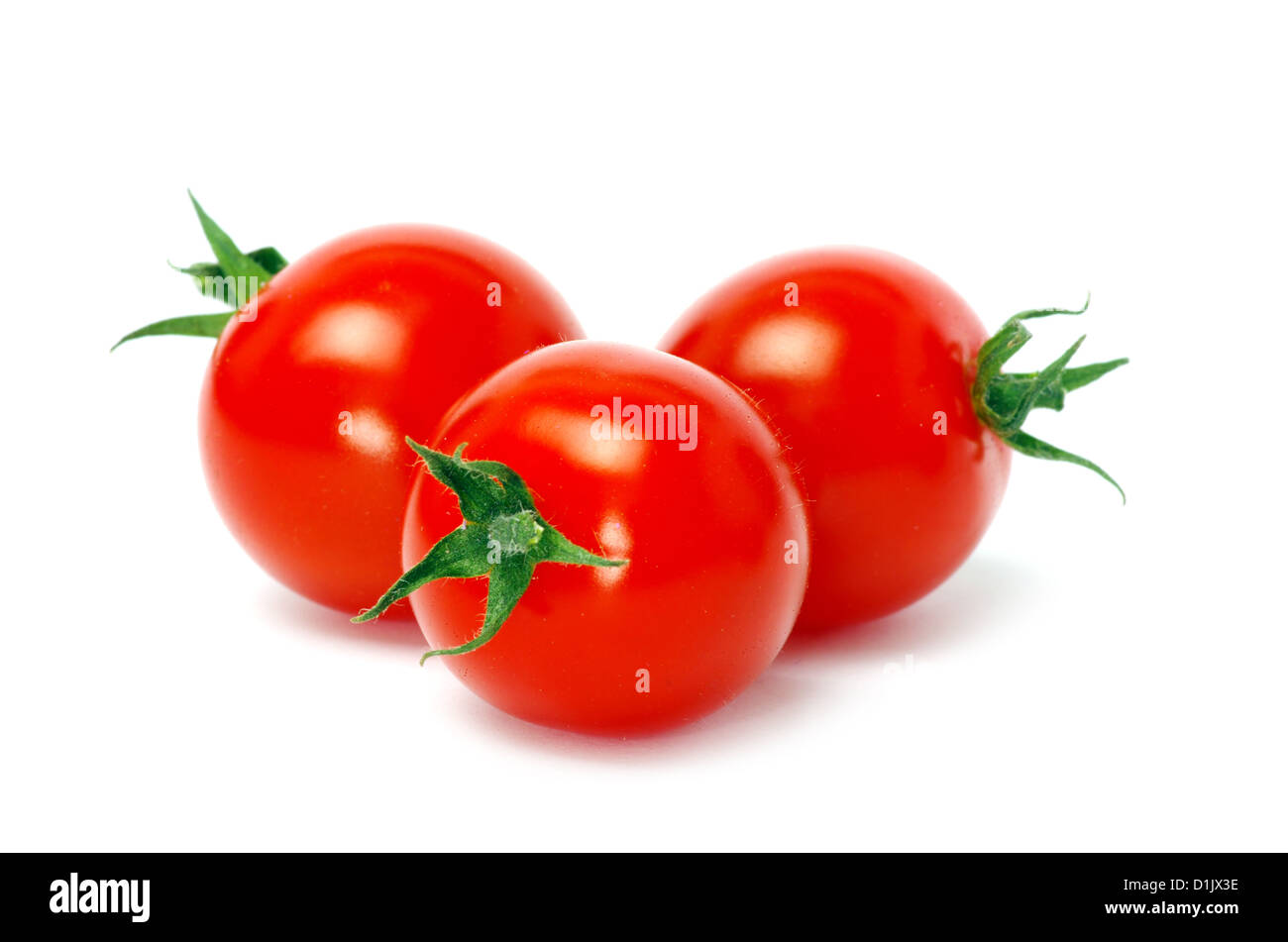 Fresh tomatoes isolated on white Stock Photo