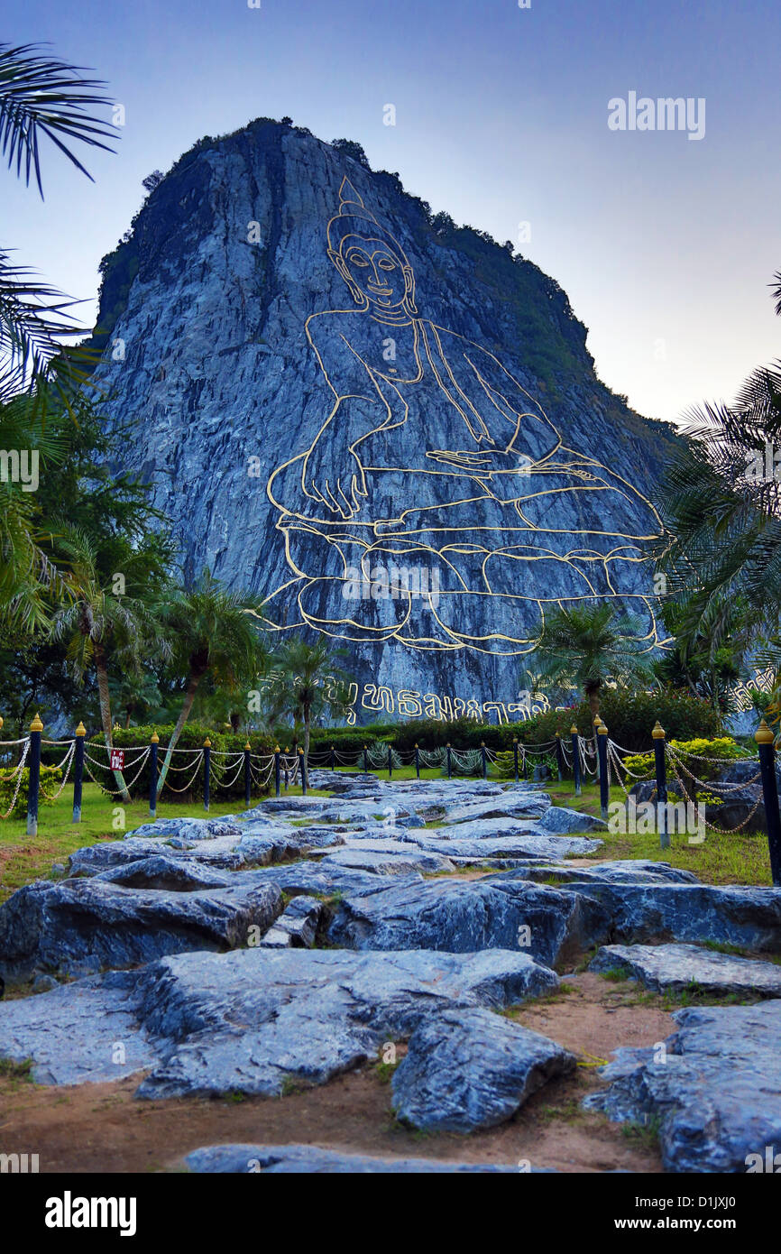 Khao Chee Chan, Buddha Mountain, Chonburi, Pattaya, Thailand a giant  Sukhothai-era Buddha sculpture engraved into a cliff face Stock Photo -  Alamy