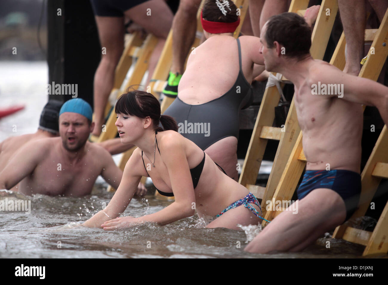 December 26, 2012 Prague, Czech Republic, Polar swimmers step into the water during their traditional Christmas swim in the Vltava river Stock Photo