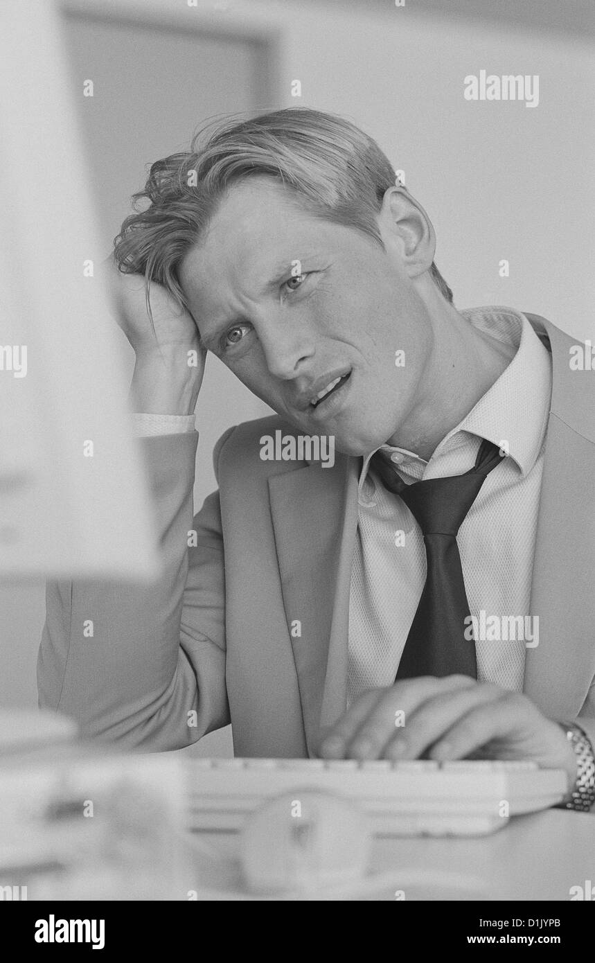 black and white business manager frustration stress businessman stressed License free except ads and billboards Stock Photo