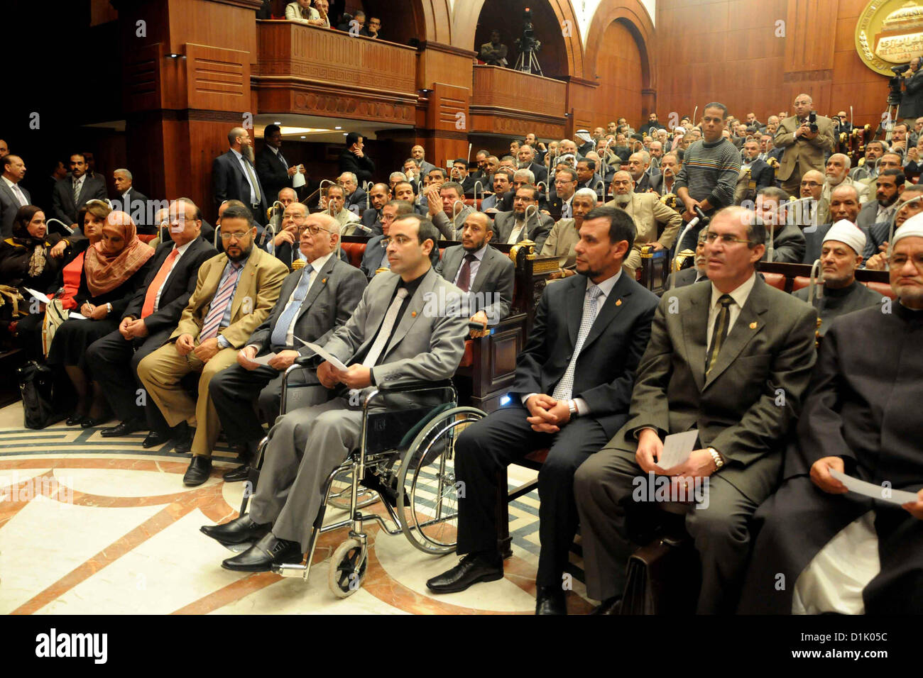 Dec. 26, 2012 - Cairo, Cairo, Egypt - Members of the Egyptian Shura Council (Upper house of the parliament), attend the first meeting after approving the new constitution, in Cairo, Egypt, 26 December 2012. According to the new constitution, the Islamist-dominated Shura Council will assume the legislative power for the first time in 32 years. Official results on 25 December showed that the Egyptian new constitution, favored by supporters of Islamist President Mohamed Morsi, was approved by 63.8 per cent of voters in a two-round referendum  (Credit Image: © Ashraf Amra/APA Images/ZUMAPRESS.com) Stock Photo