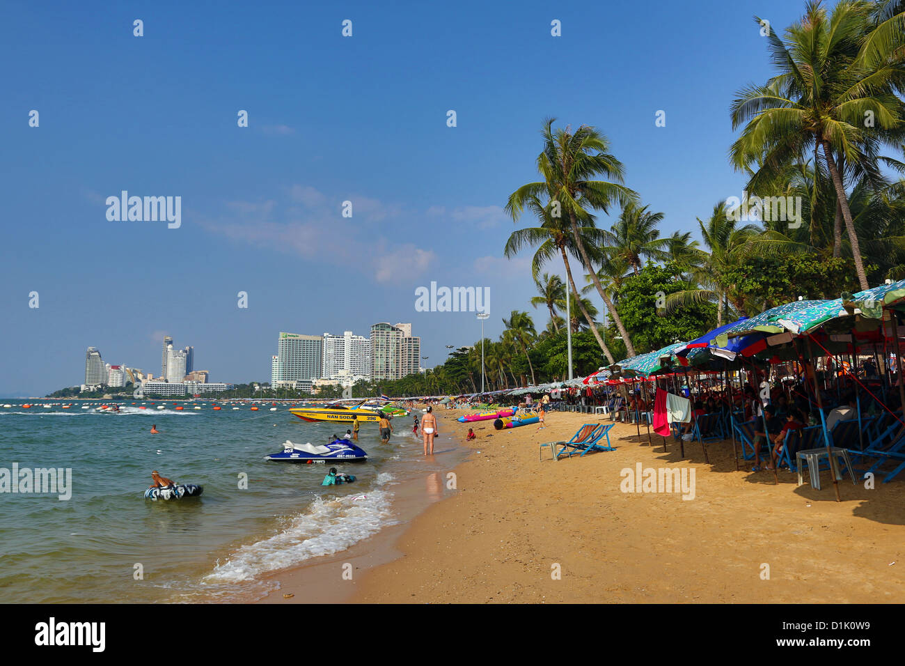 Beach scene on the seafront of Pattaya, Thailand Stock Photo