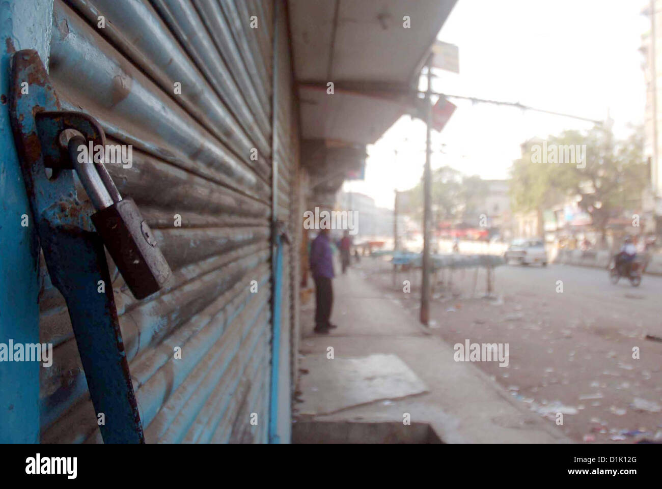 Shops are seen closed during strike called by Ahle Sunnat  Wal Jamat (Defunct Sipah-e-Sahaba) against an assassination attack on their leader Aurangzeb  Farooqi convoy and killing of his seven gunmen and driver, at Saddar Market in Saddar area in  Karachi on Wednesday, December 26, 2012. Stock Photo