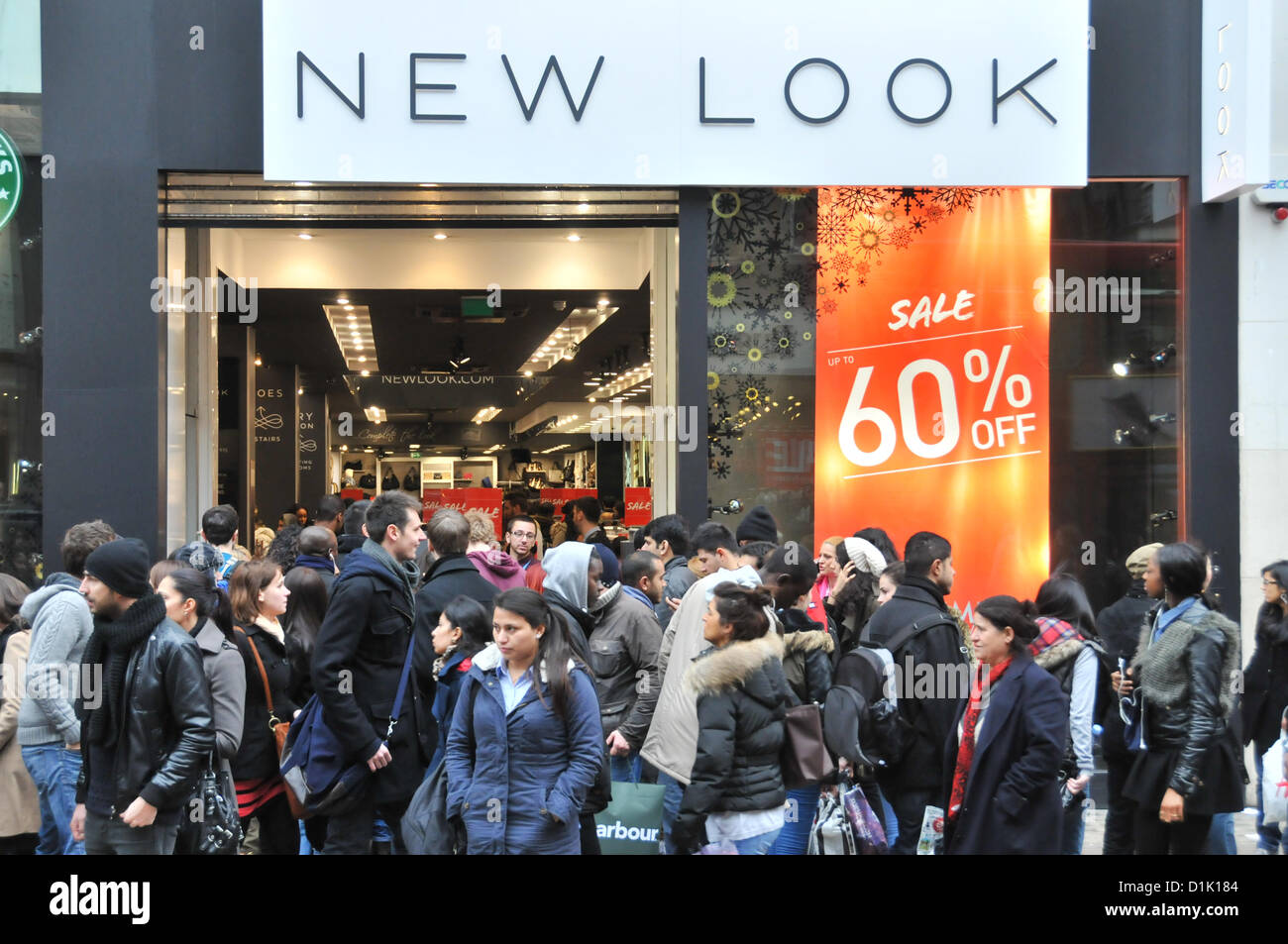 Oxford Street, London, UK. 26th December 2012. Boxing Day shoppers outside New Look on Oxford Street. Shoppers fill the streets at the Boxing Day sales in central London. Credit:  Matthew Chattle / Alamy Live News Stock Photo