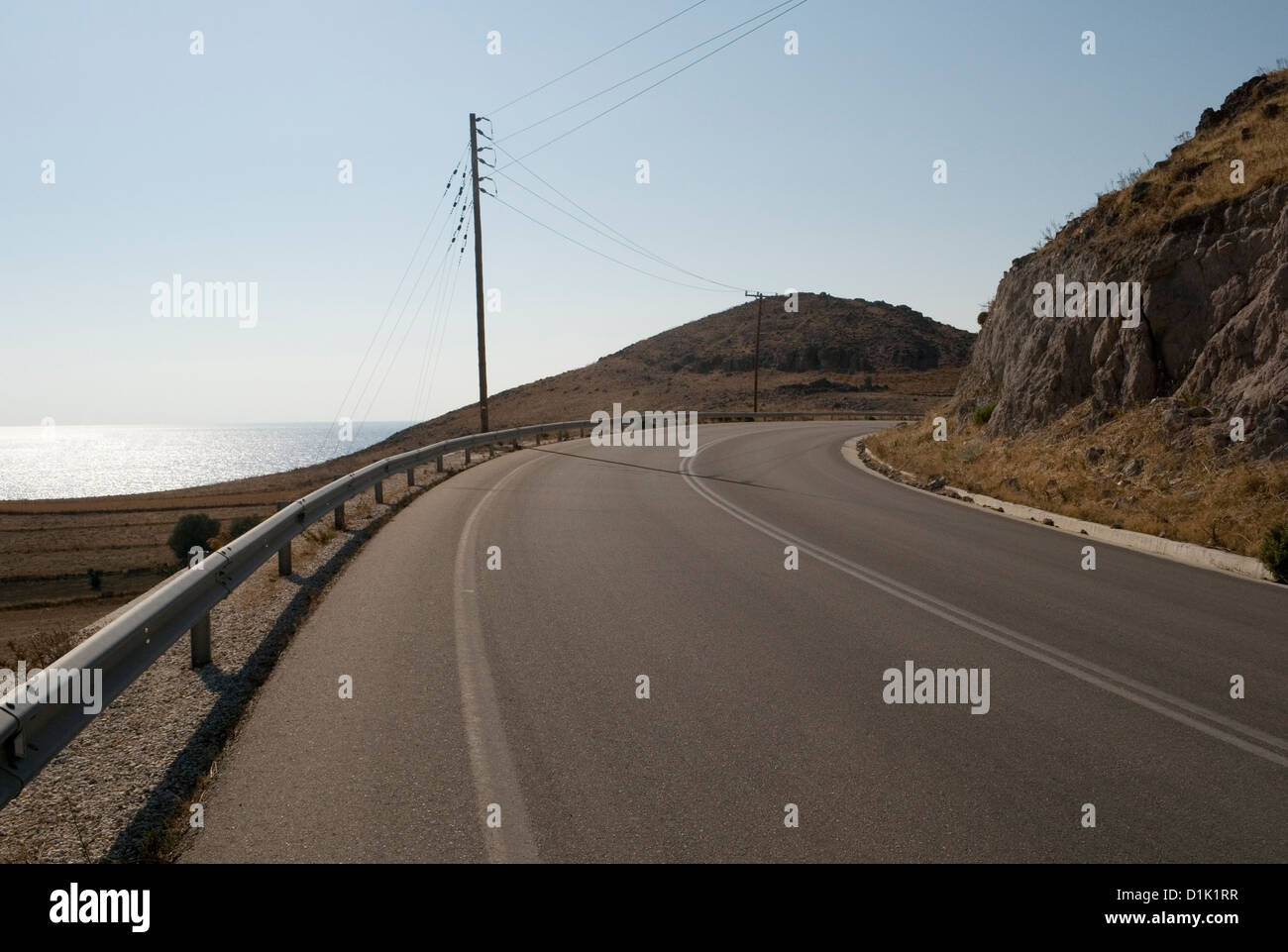 curved road, Limnos, Greece Stock Photo