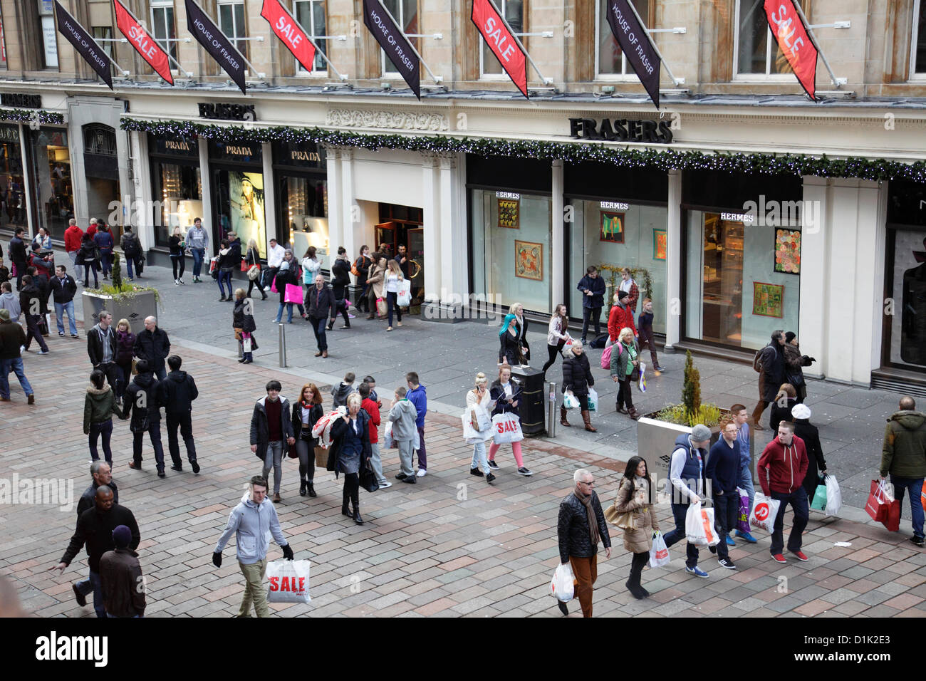 Buchanan Street, Glasgow, Scotland, UK, Wednesday, 26th December, 2012. People shopping at the Boxing Day sales in the city centre beside the House of Fraser Department Store Stock Photo
