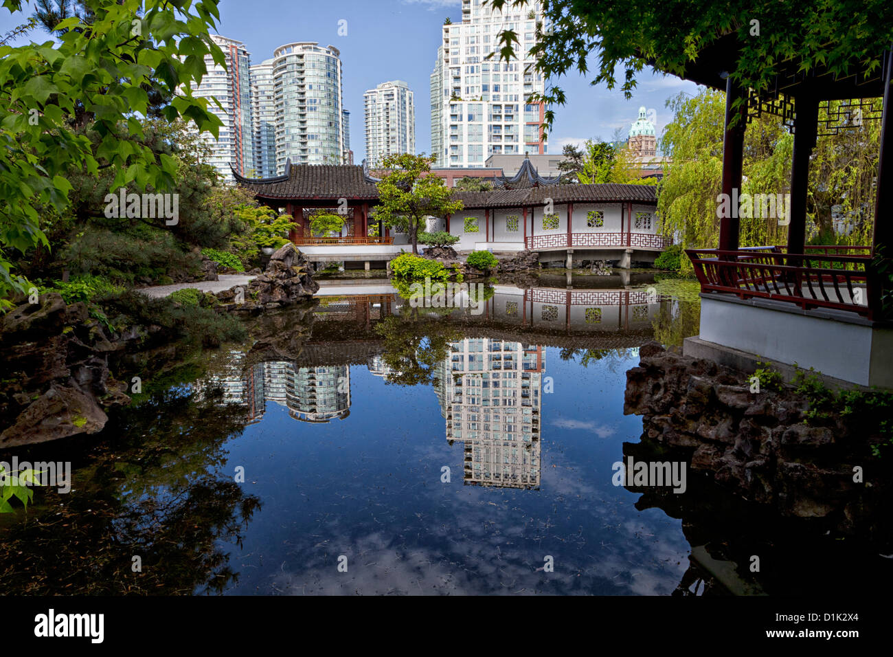 Reflections of Vancouver in the Dr. Sun Yat Sen Garden Pond, the Chinese Cultural Garden and major tourist attraction. Stock Photo