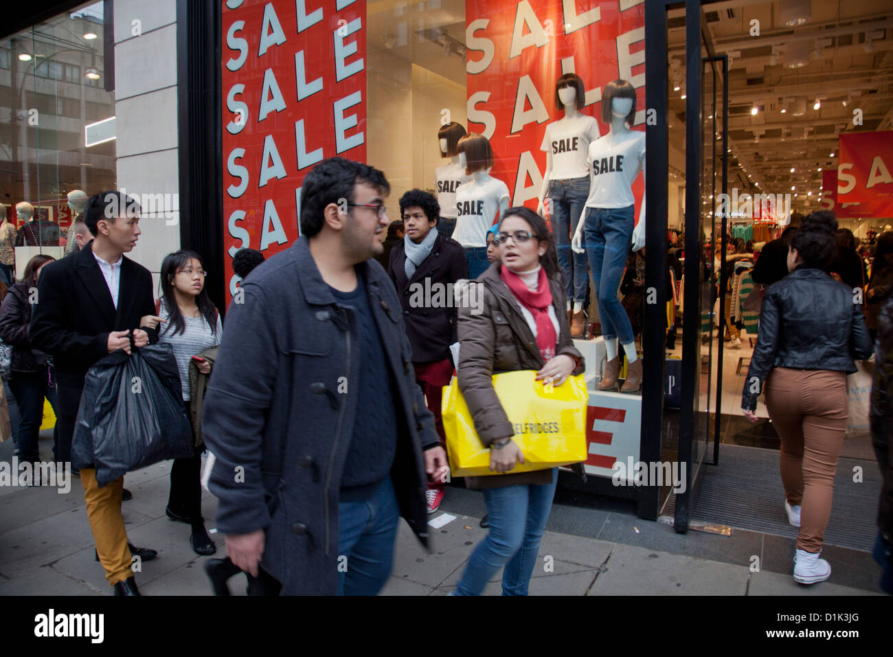 Tourists and shoppers at sales in department stores in Oxford St