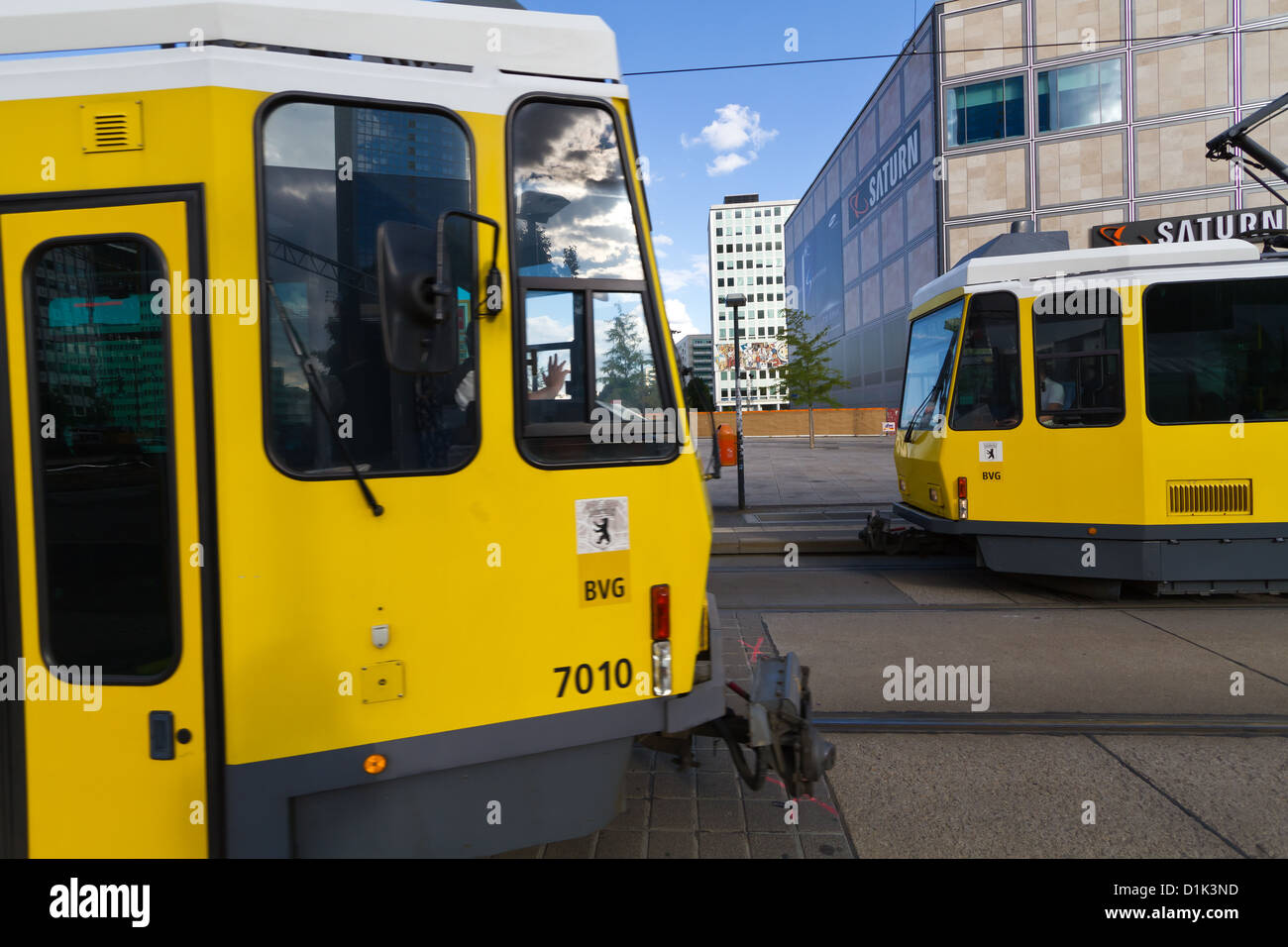 Yellow Tram at the Alexanderplatz in Berlin, Germany Stock Photo
