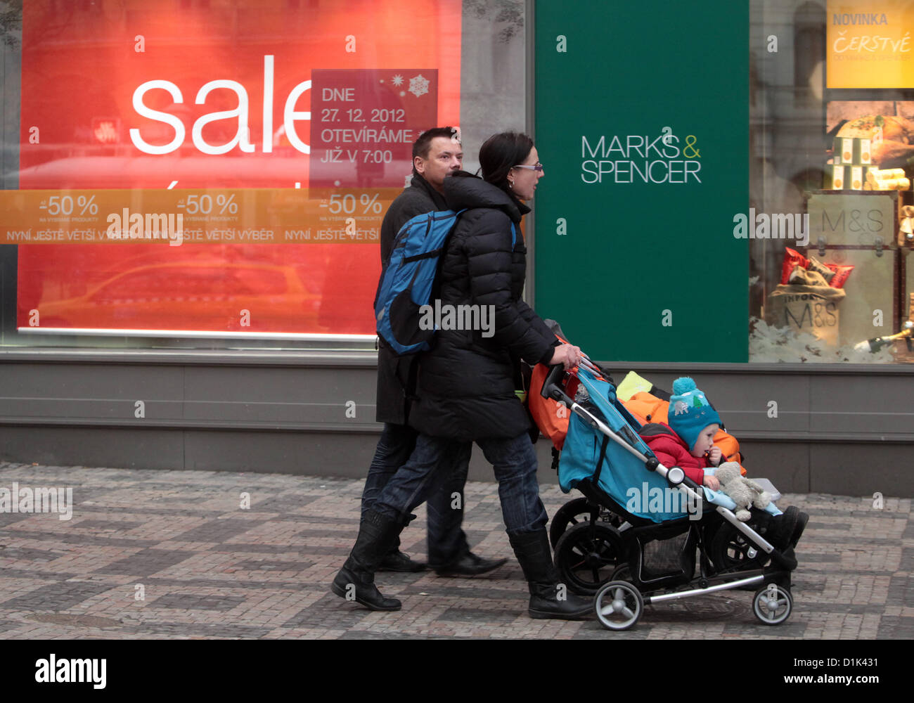 Shop sale signs, People walking around Marks & Spencer store on Wenceslas Square, Prague Czech Republic Stock Photo