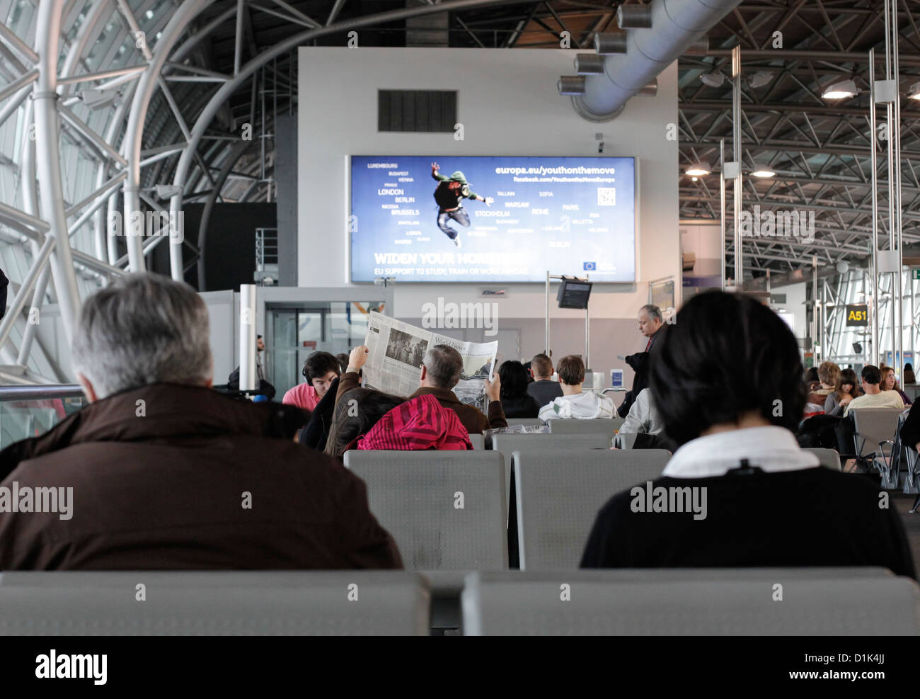 Passengers waiting at airport hi-res stock photography and images - Alamy