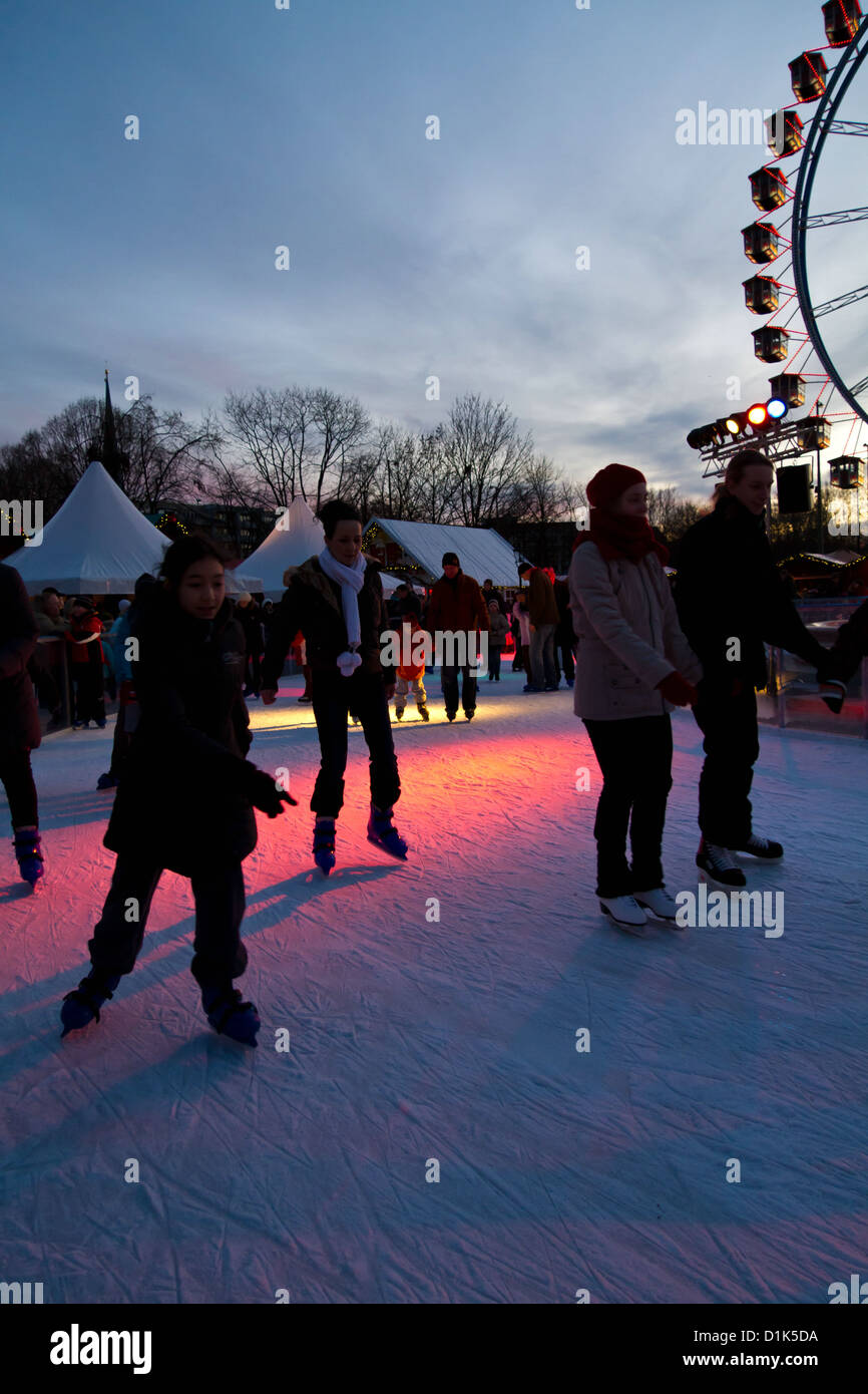 Ice Skating on the Christmas Fair on Alexanderplatz in Berlin, Germany