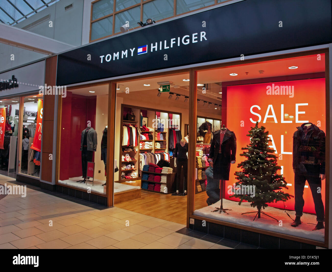 Interior of York Designer Outlet, York, North Yorkshire, England, United  Kingdom on Boxing Day, 26th December 2012 showing 'Sale' sign in Tommy  Hilfiger window. Thousands of bargain-hunters flock to shopping centres  across