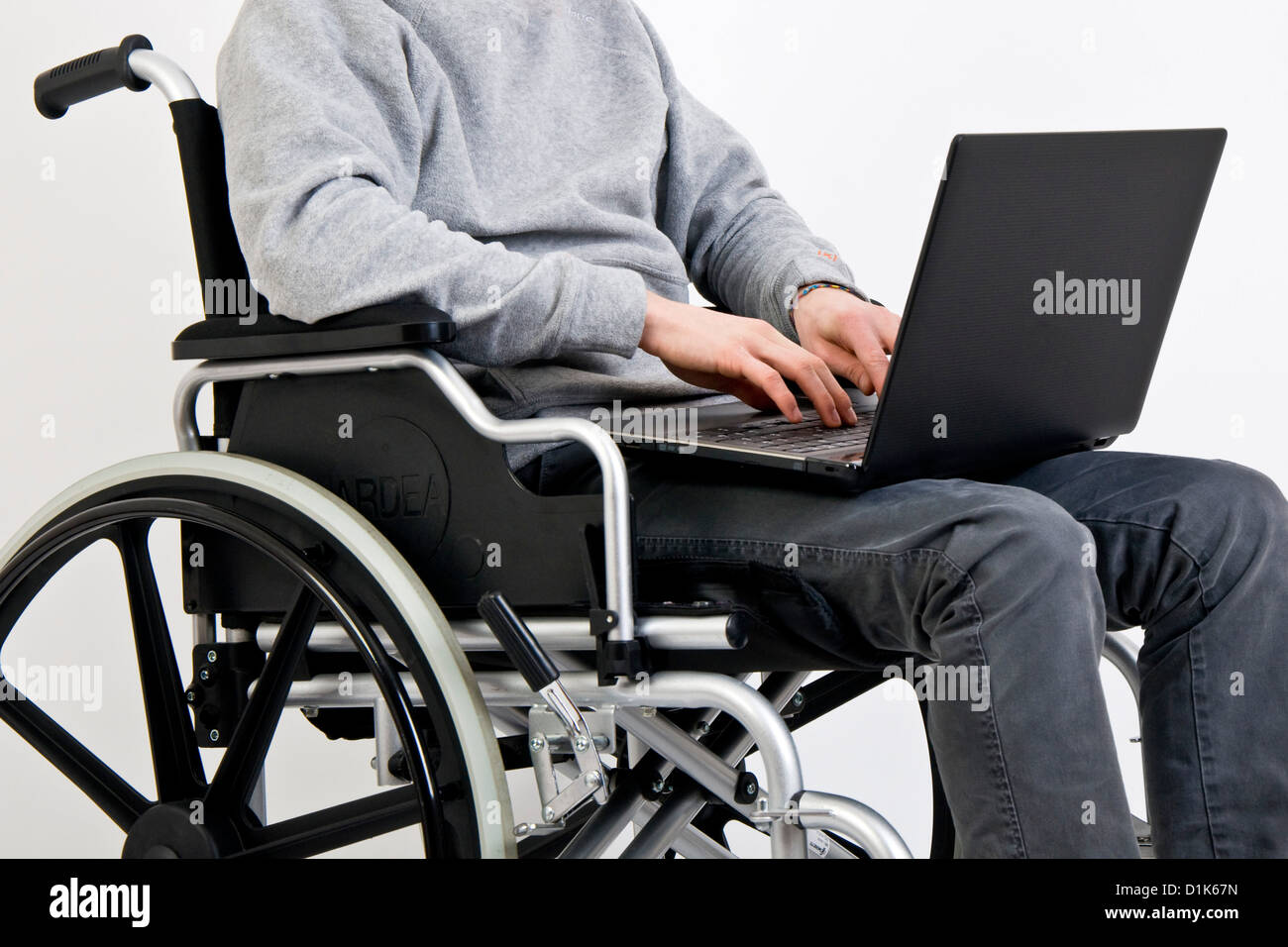 Disabled with computer Stock Photo Alamy