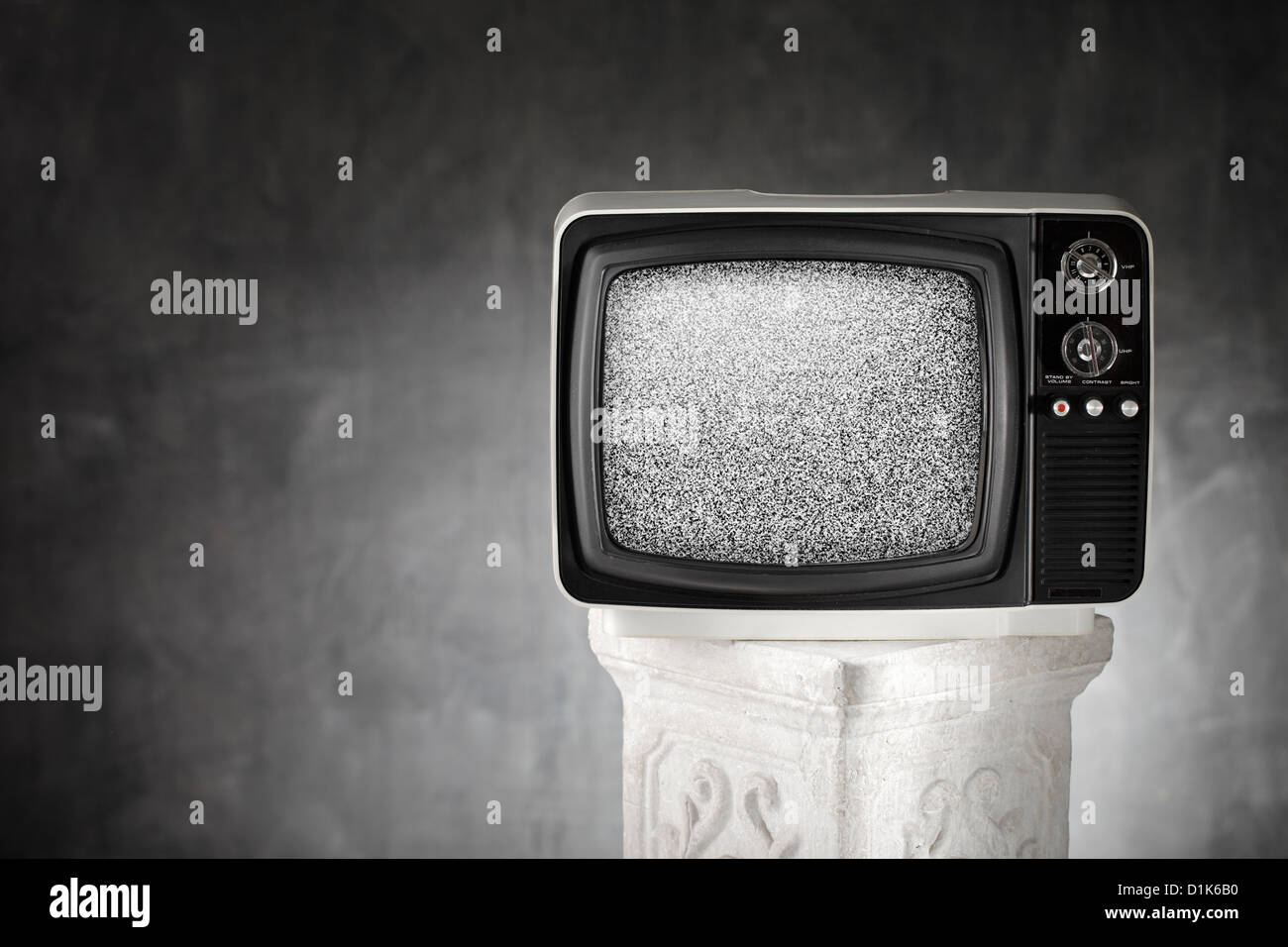 Old portable television with static noise. Stock Photo
