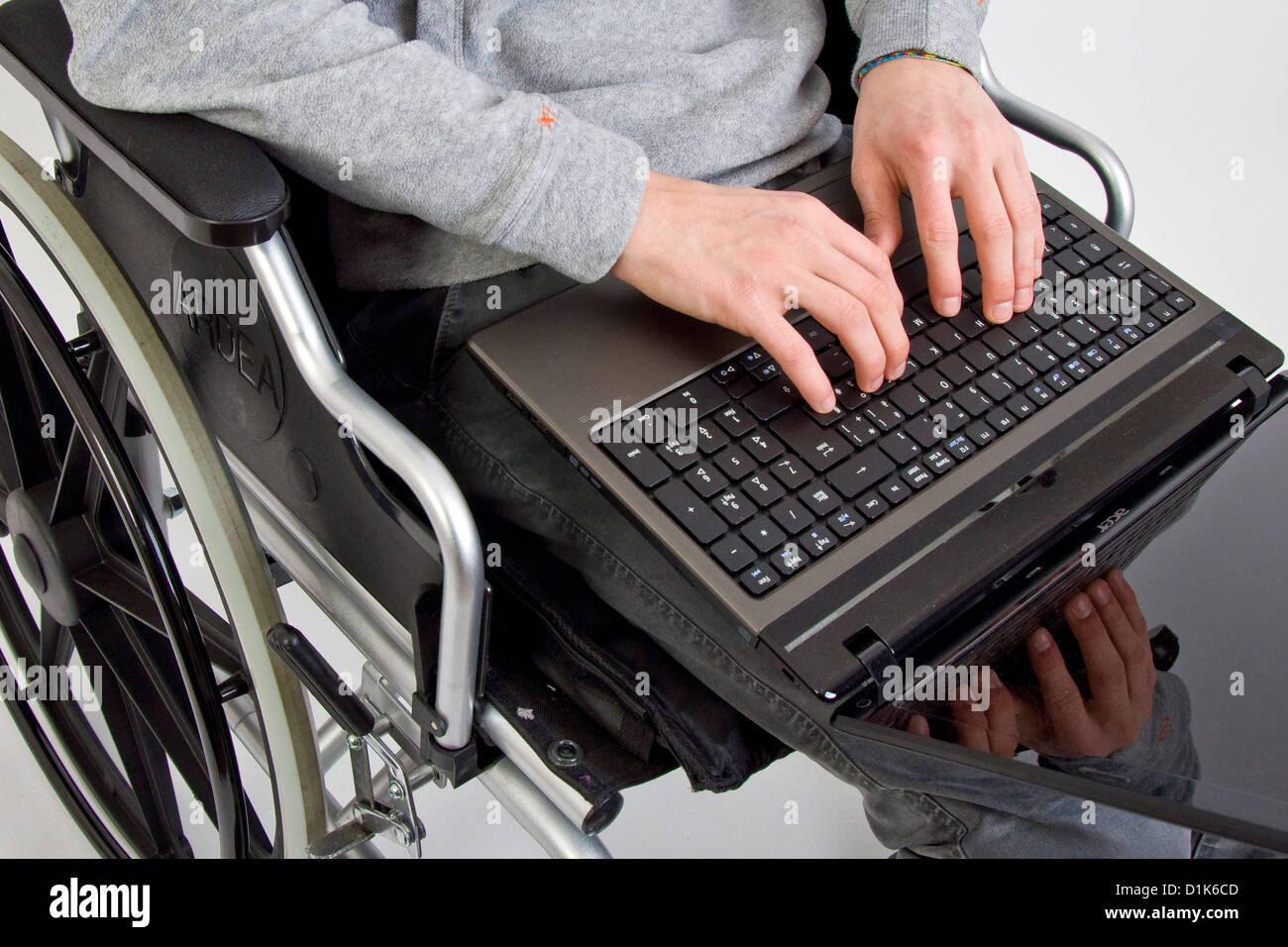 Disabled with computer Stock Photo Alamy